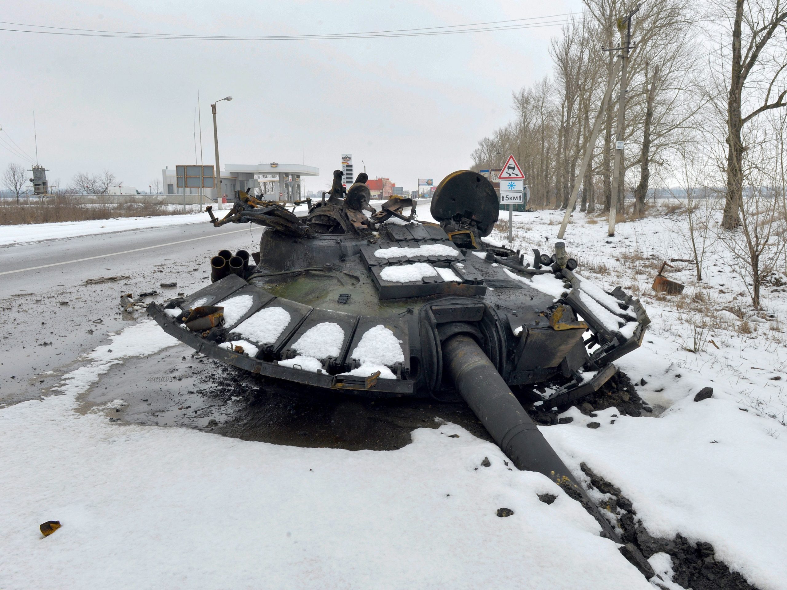 A fragment of a destroyed Russian tank is seen on the roadside on the outskirts of Kharkiv on February 26, 2022, following the Russian invasion of Ukraine.