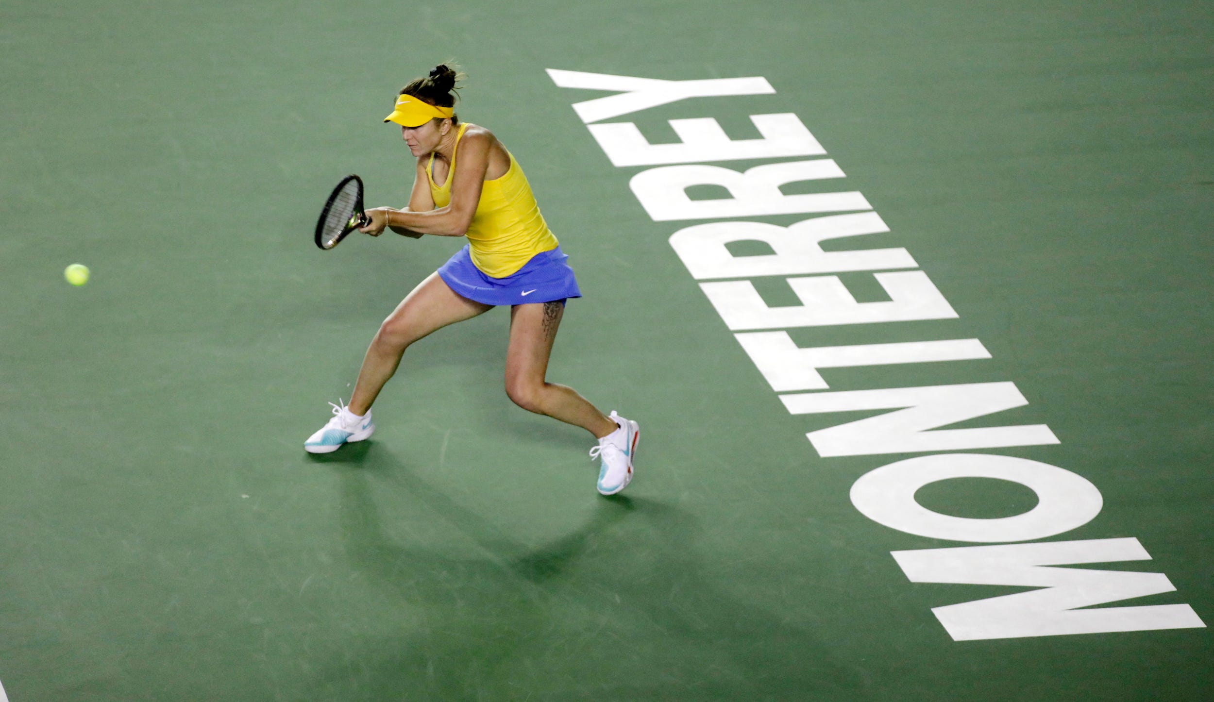 Svitolina sports a yellow and blue outfit in an homage to the colors on Ukraine's flag.