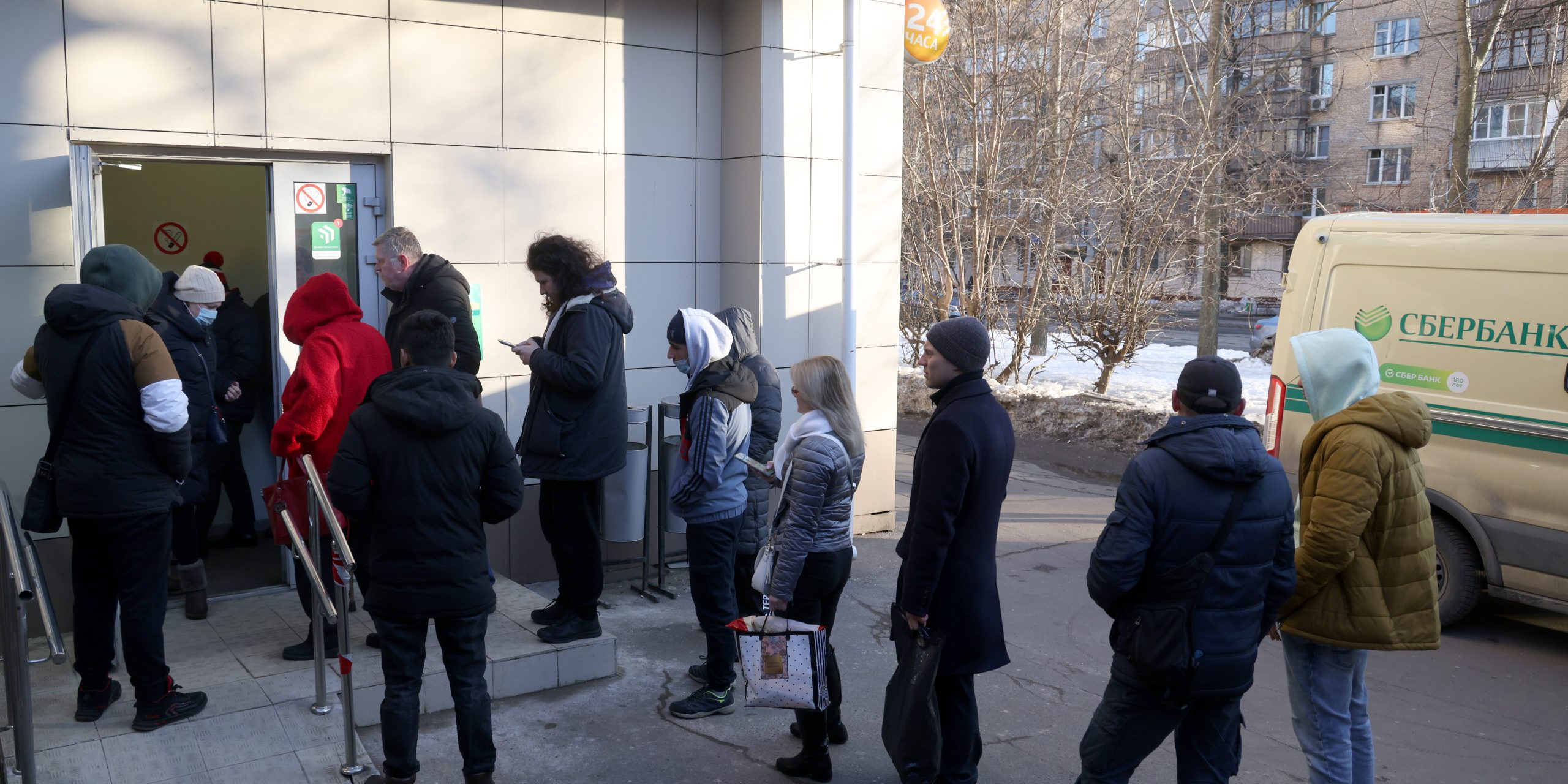 People queue for a Sberbank branch in Moscow, Russia.