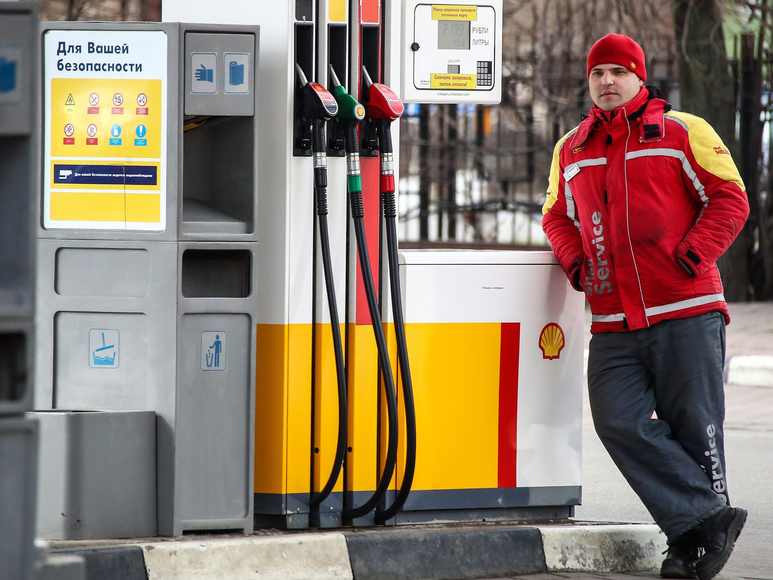 A worker at a Shell gas station in Leningradskoye Highway, Moscow, Russia.