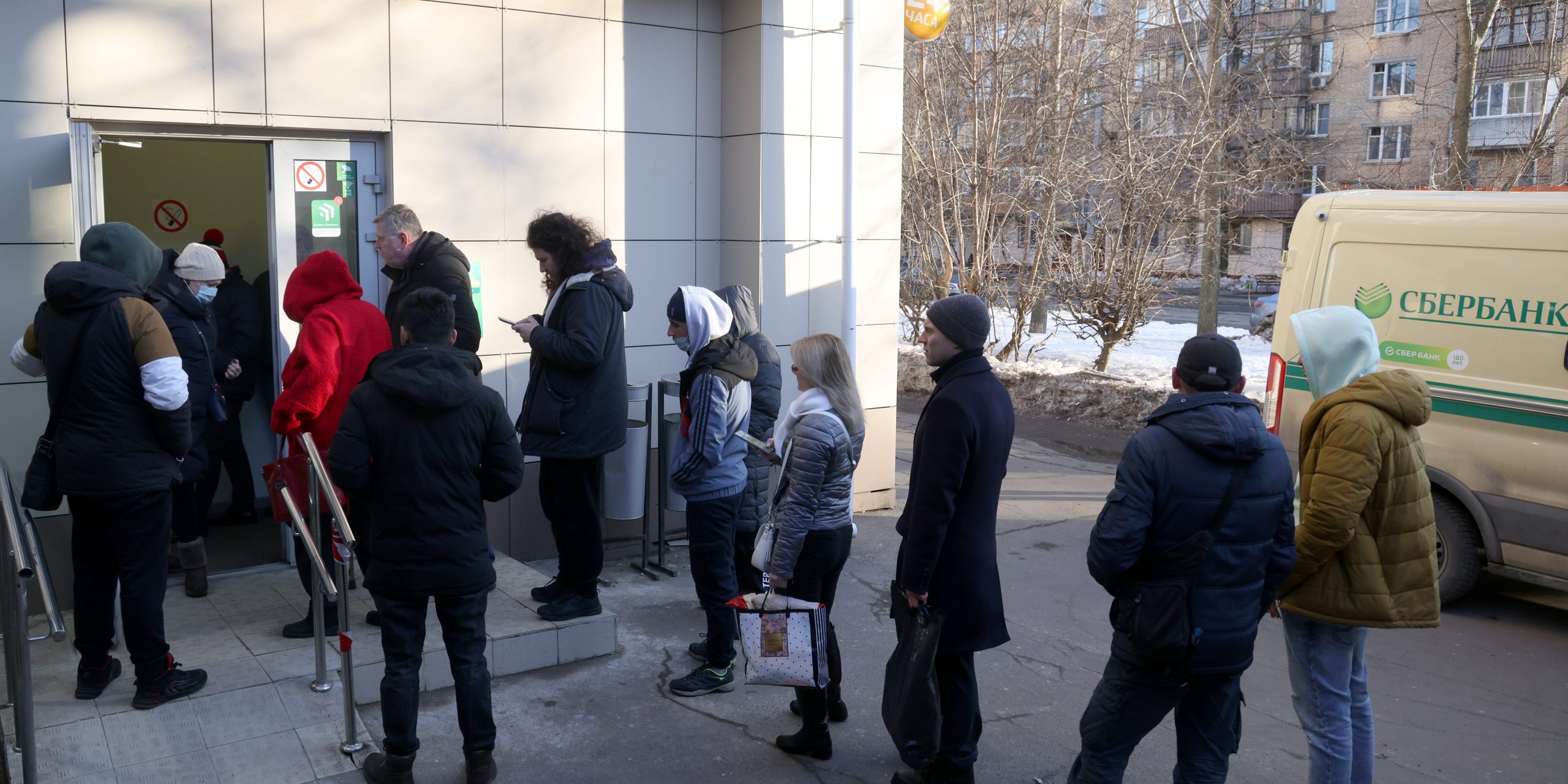 People queue for a Sberbank branch in Moscow, Russia.