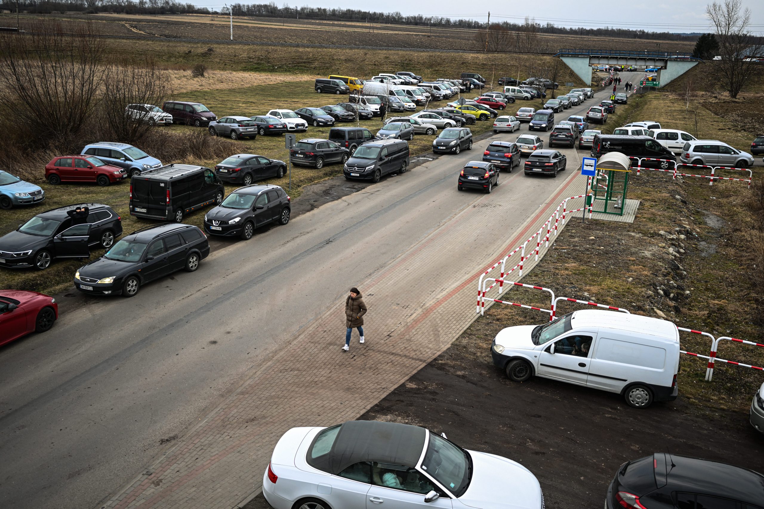 Hundreds of Polish residents drove to the Ukraine-Poland border to pick up fleeing relatives when war first broke out.