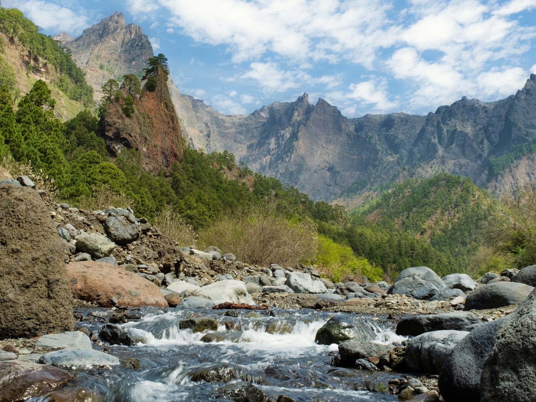 Mountains and a rock-filled stream inside Caldera Taburiente on La Palma, Canary Islands