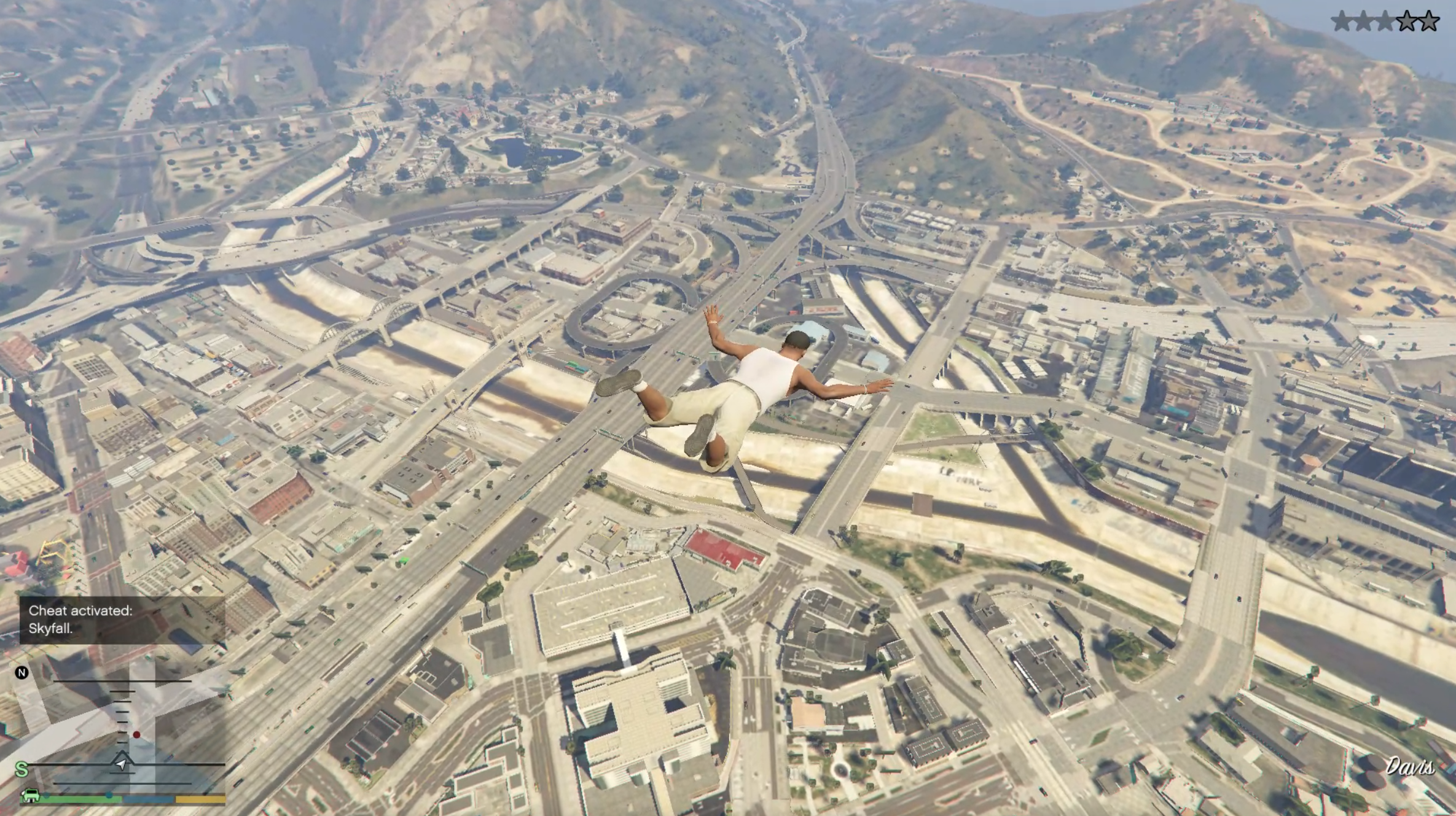 A screenshot from Grand Theft Auto 5, showing the character Franklin falling from the sky.