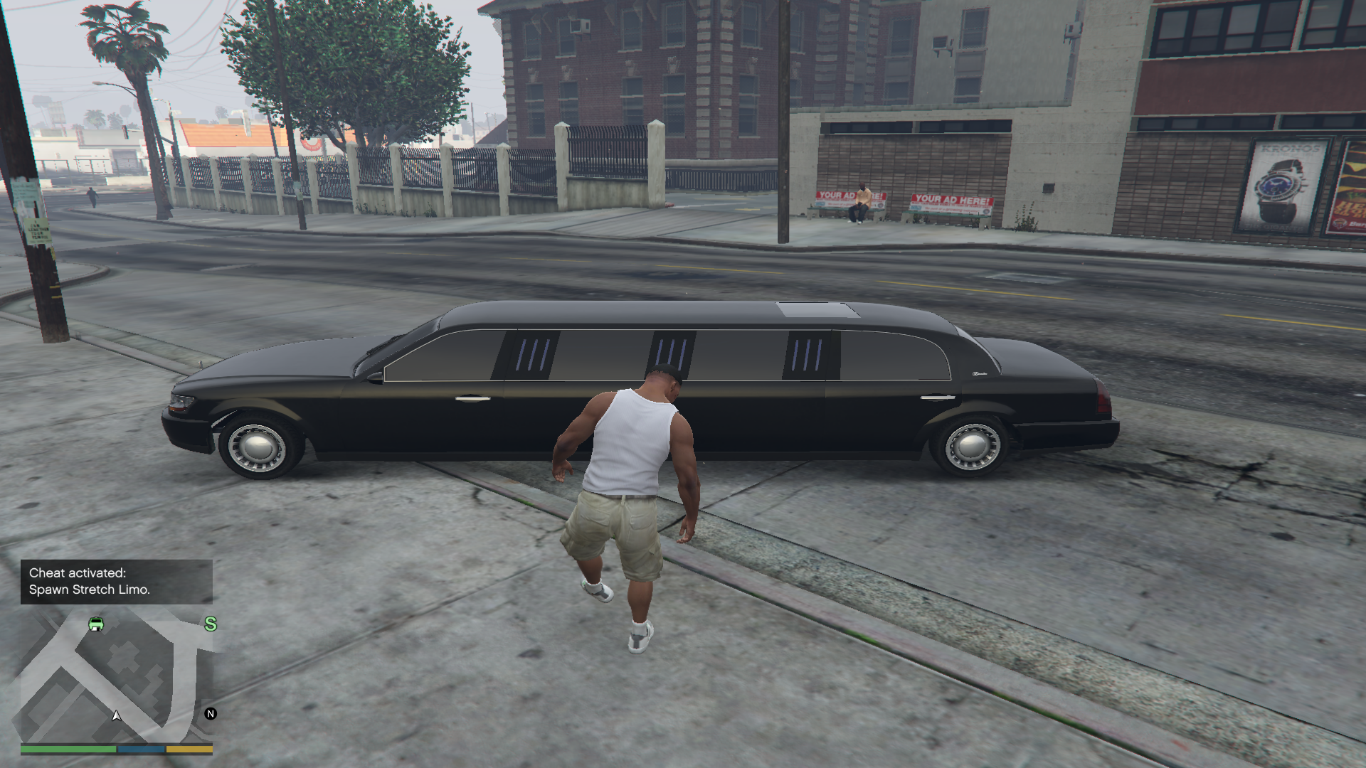 A screenshot from Grand Theft Auto 5, showing the character Franklin in front of a limousine.