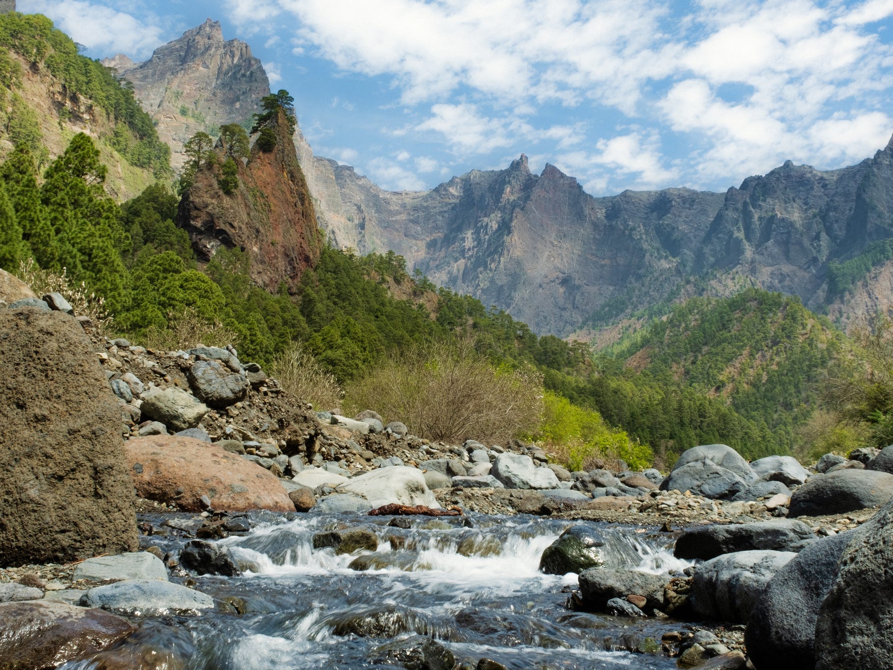 Mountains and a rock-filled stream inside Caldera Taburiente on La Palma, Canary Islands