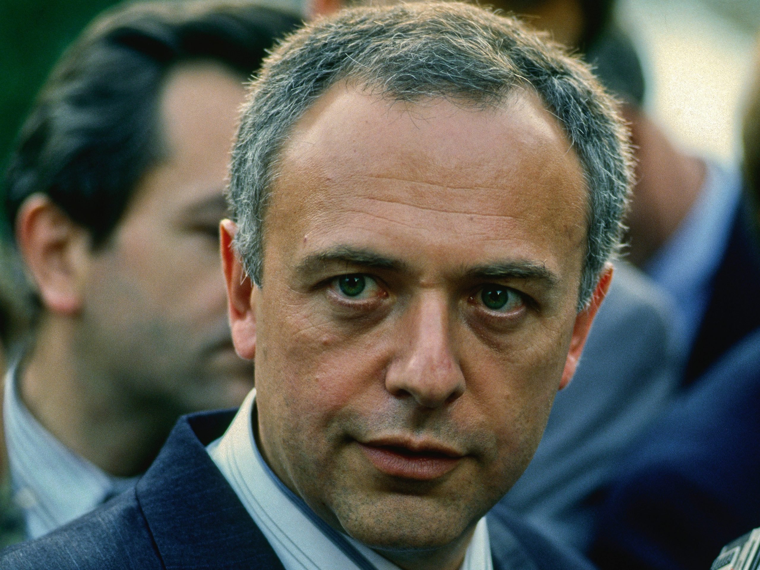 Russian Foreign Minister Andrei Kozyrev speaks with journalists in the west driveway of the White House, Washington DC, September 29, 1993.