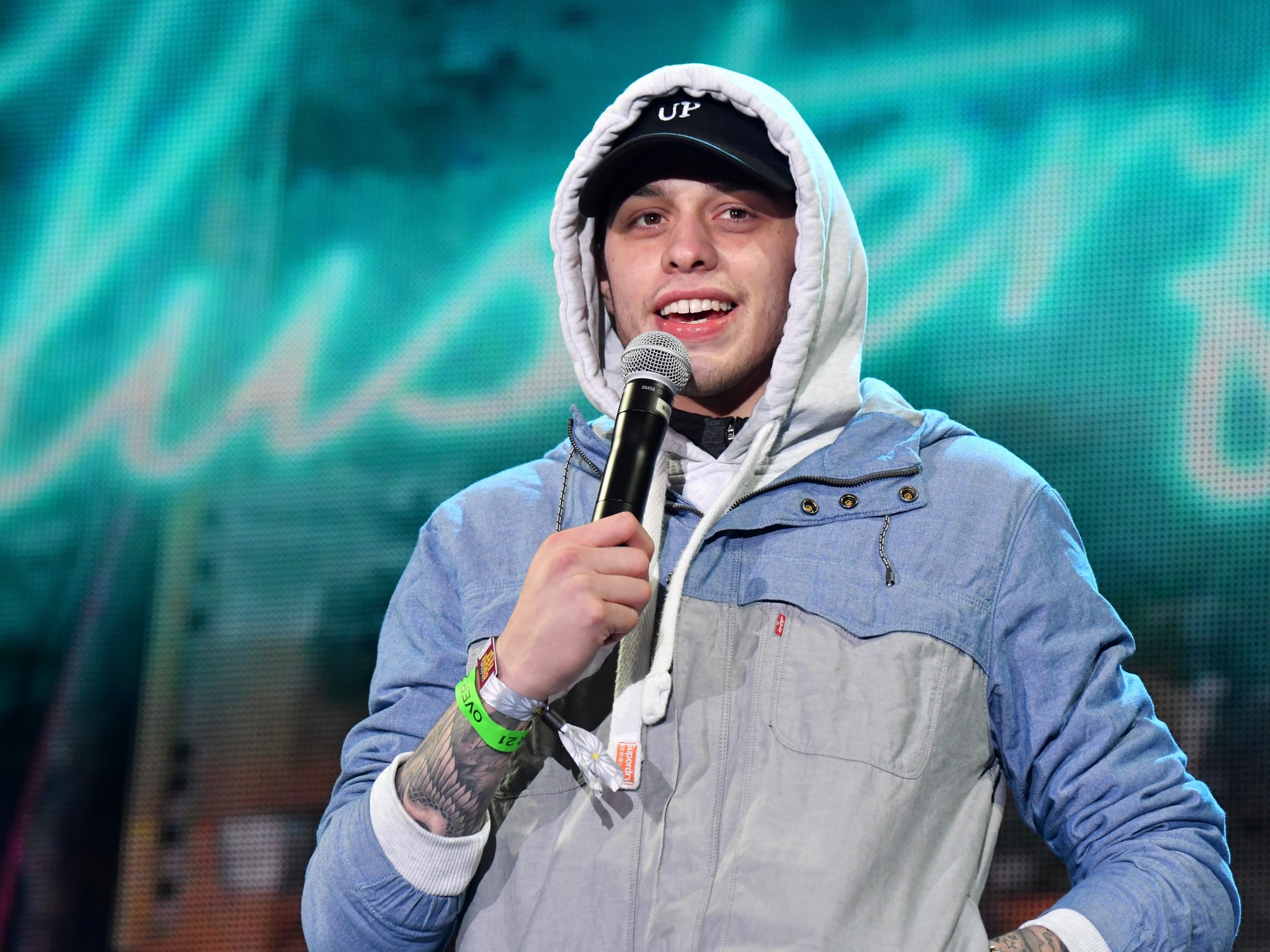 Pete Davidson performs onstage at the Colossal Stage during Colossal Clusterfest.