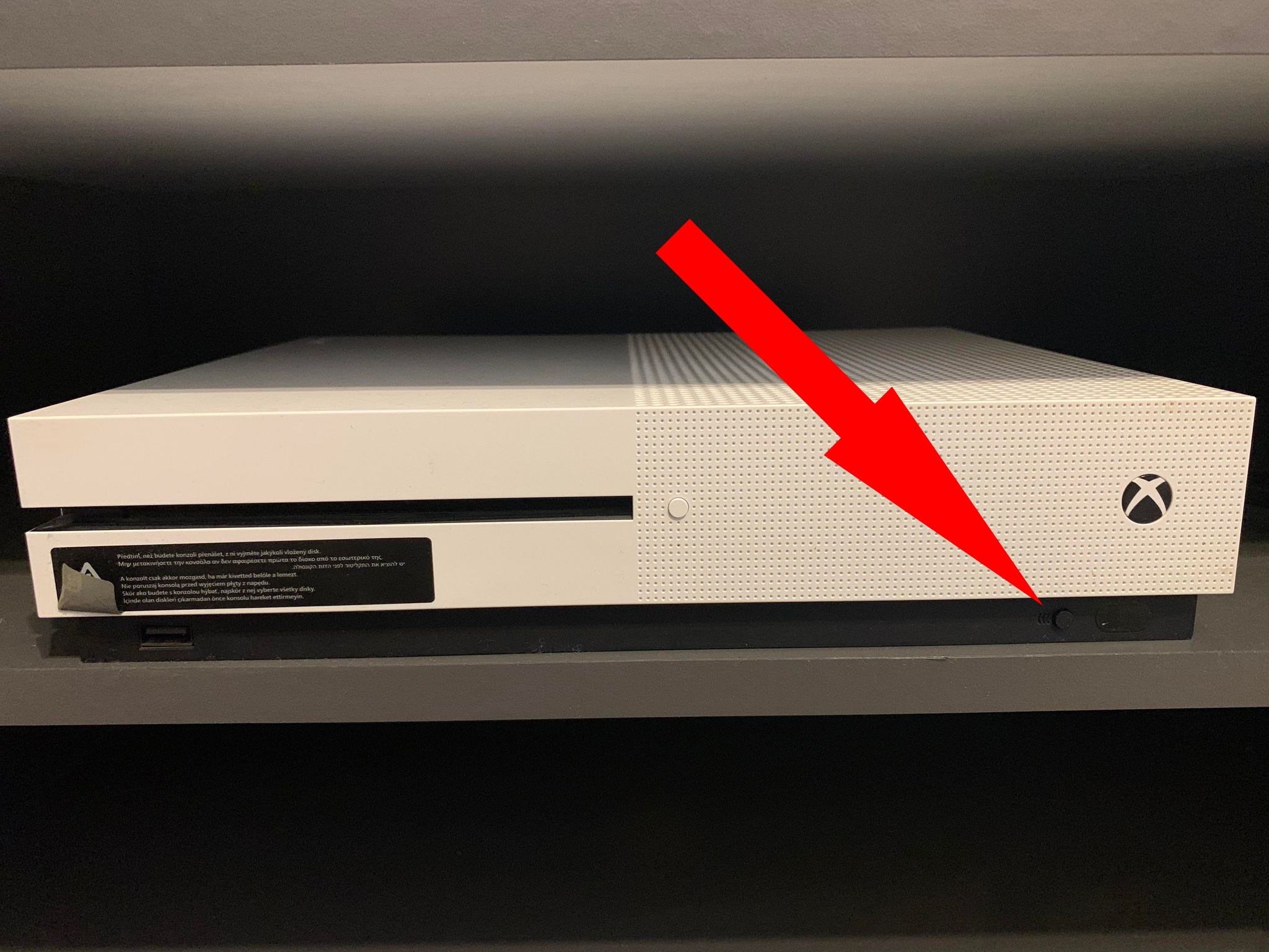 The “Pair button” on the Xbox One S on the right.