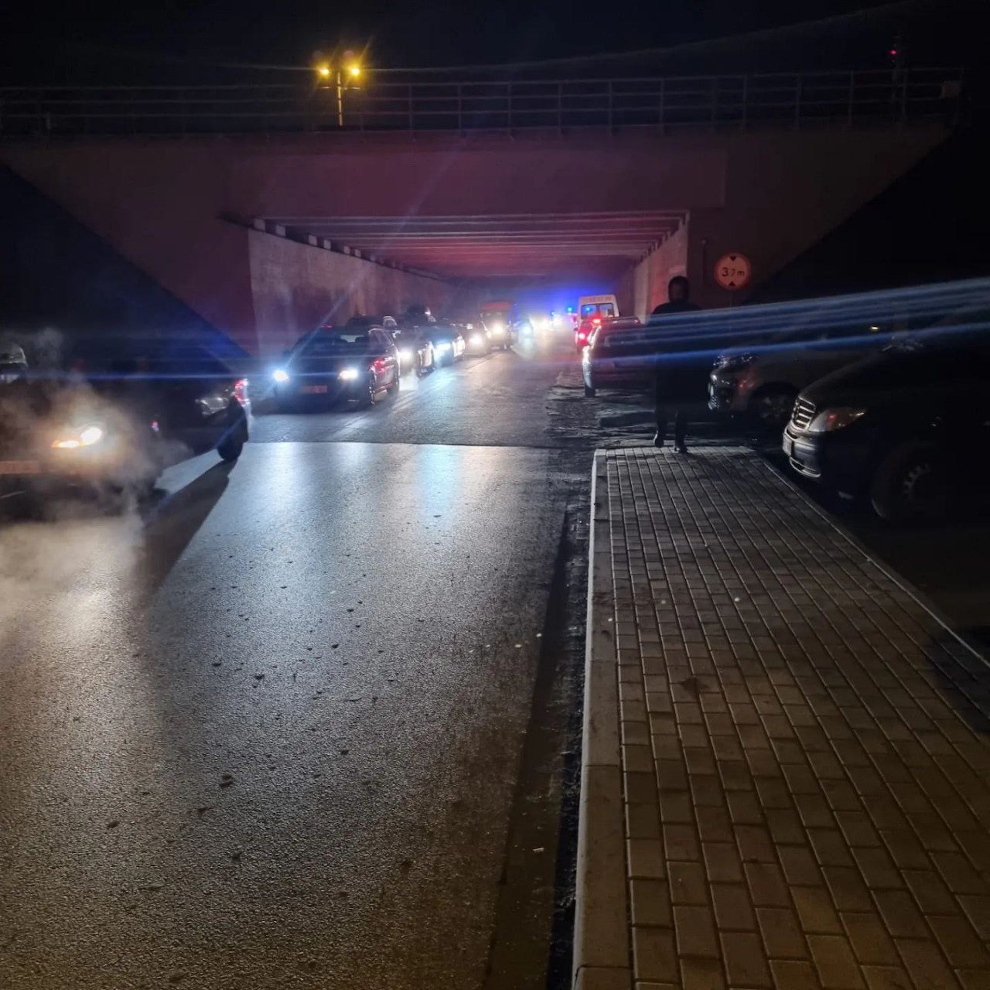 A queue of cars from across Europe near the Ukraine-Poland border, pictured at night