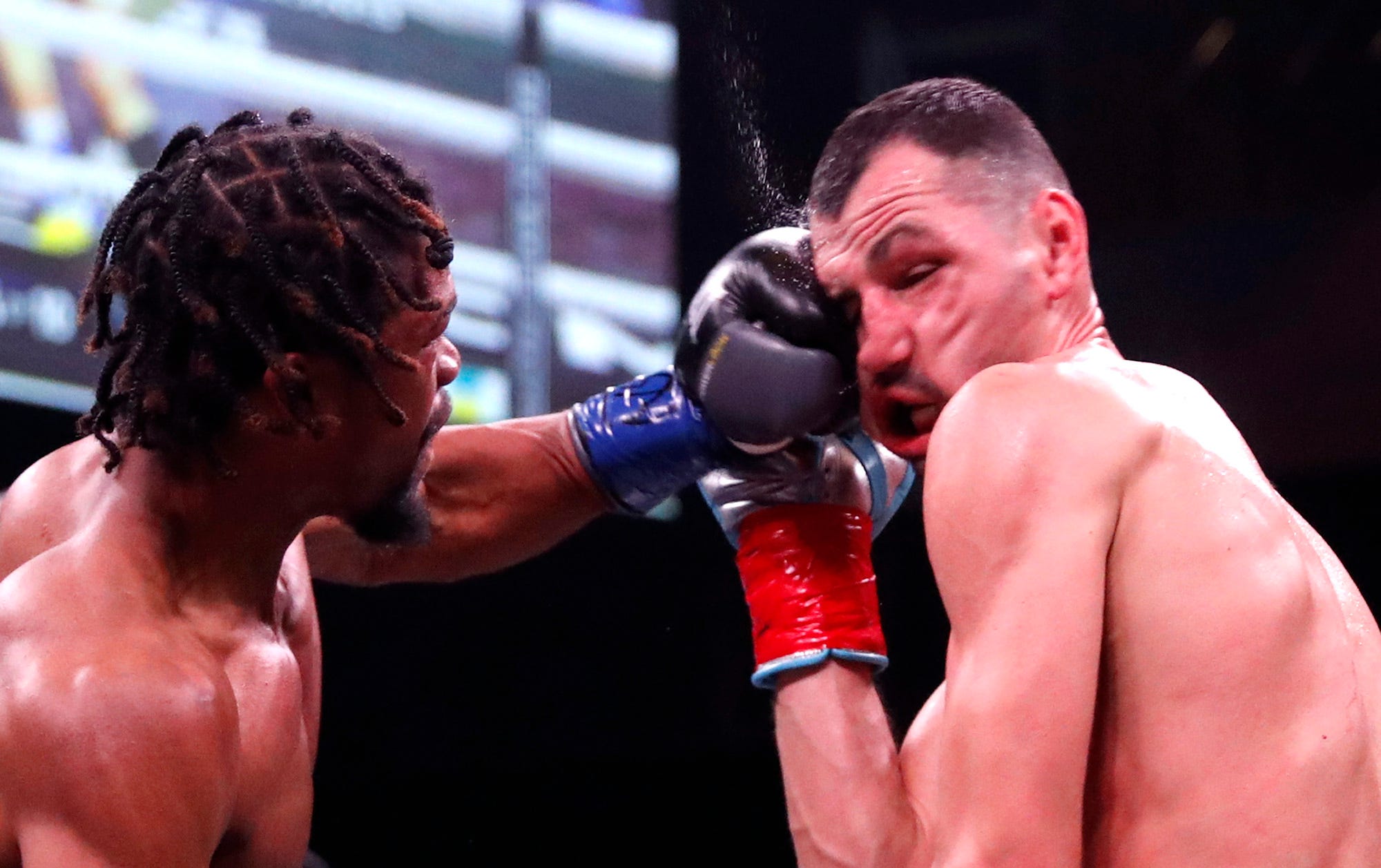 Gary Antuanne Russell boxing Viktor Postol in Las Vegas.