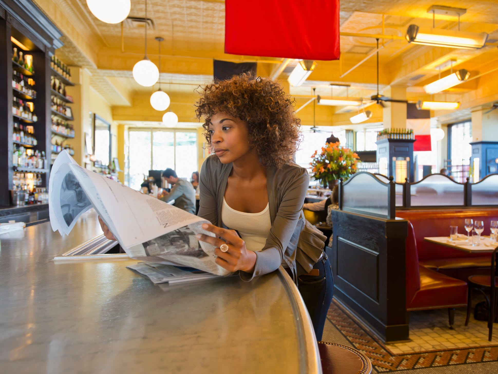 Woman reading at cafe