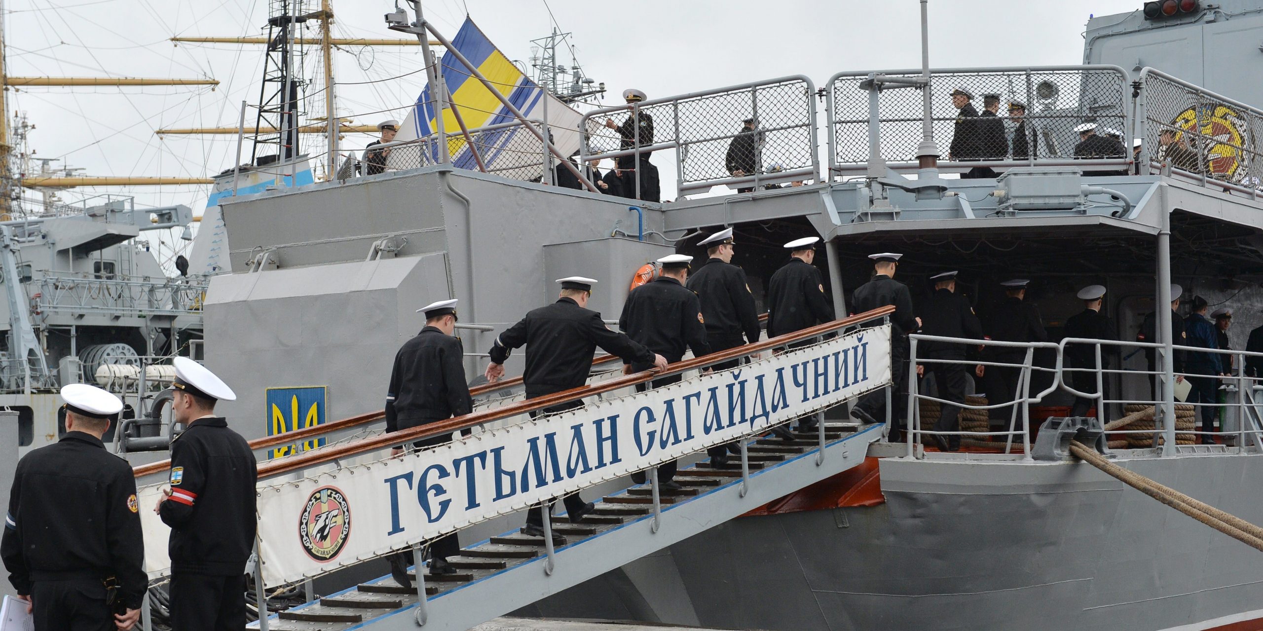 Ukrainian Navy officers ascend to the board of frigate Hetman Sahaydachniy (U130), flagship of Ukrainian Navy in southern Ukrainian city Odessa on May 3, 2015.
