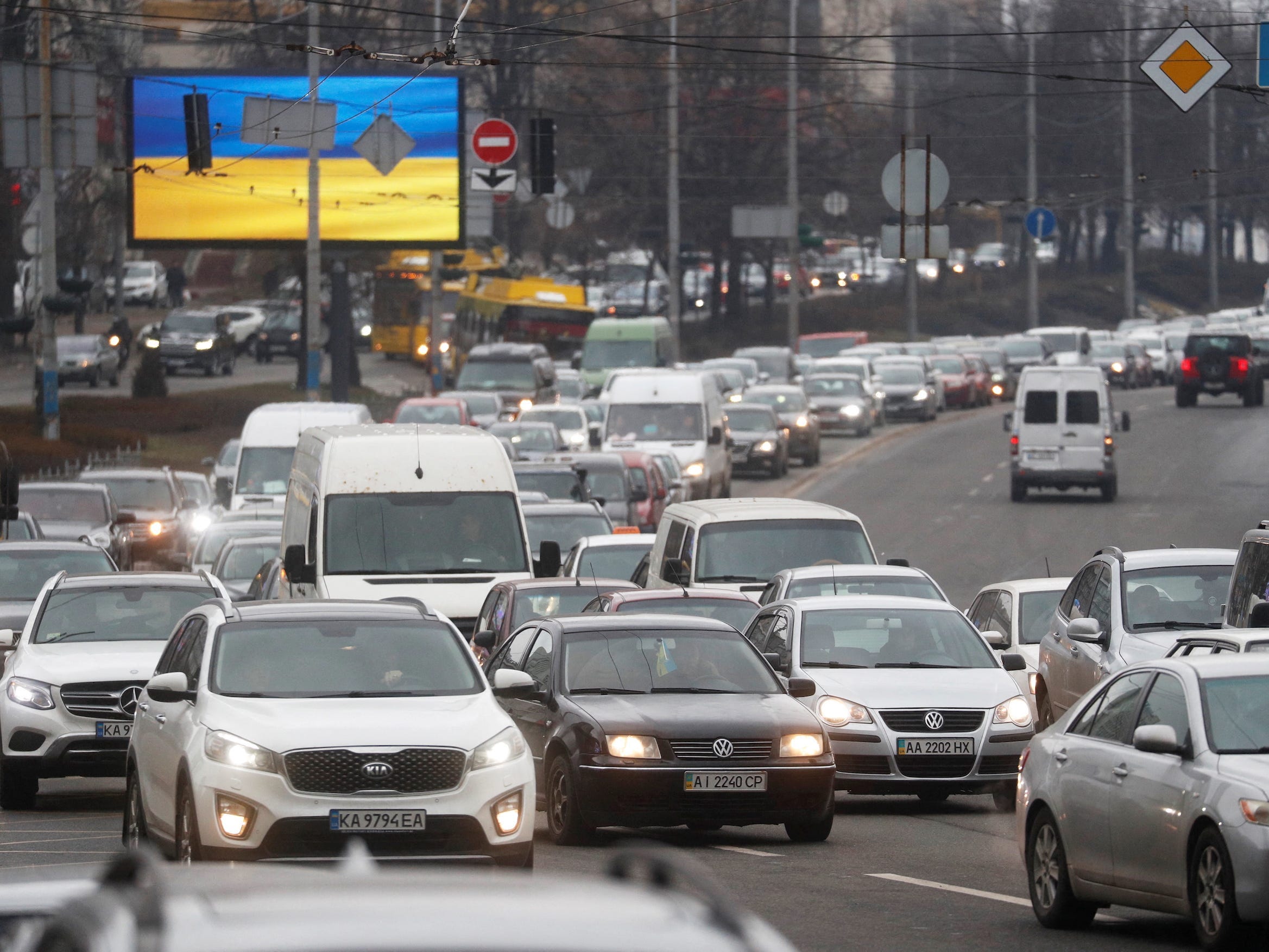 lines of cars heavy outbound traffic in kyiv