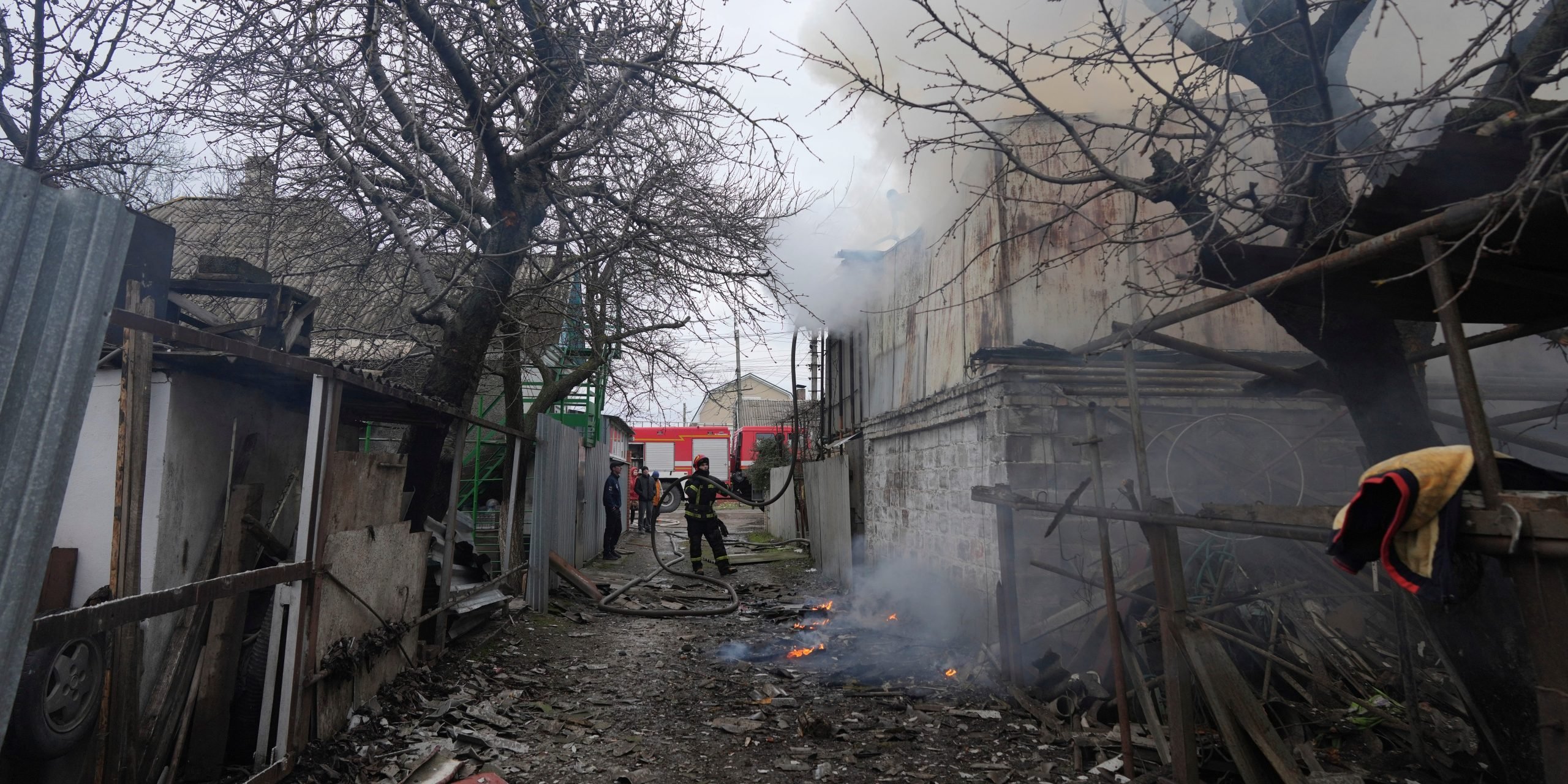 A firefighter works amongst debris in the aftermath of Russian shelling, in Mariupol, Ukraine, Thursday, Feb. 24, 2022.