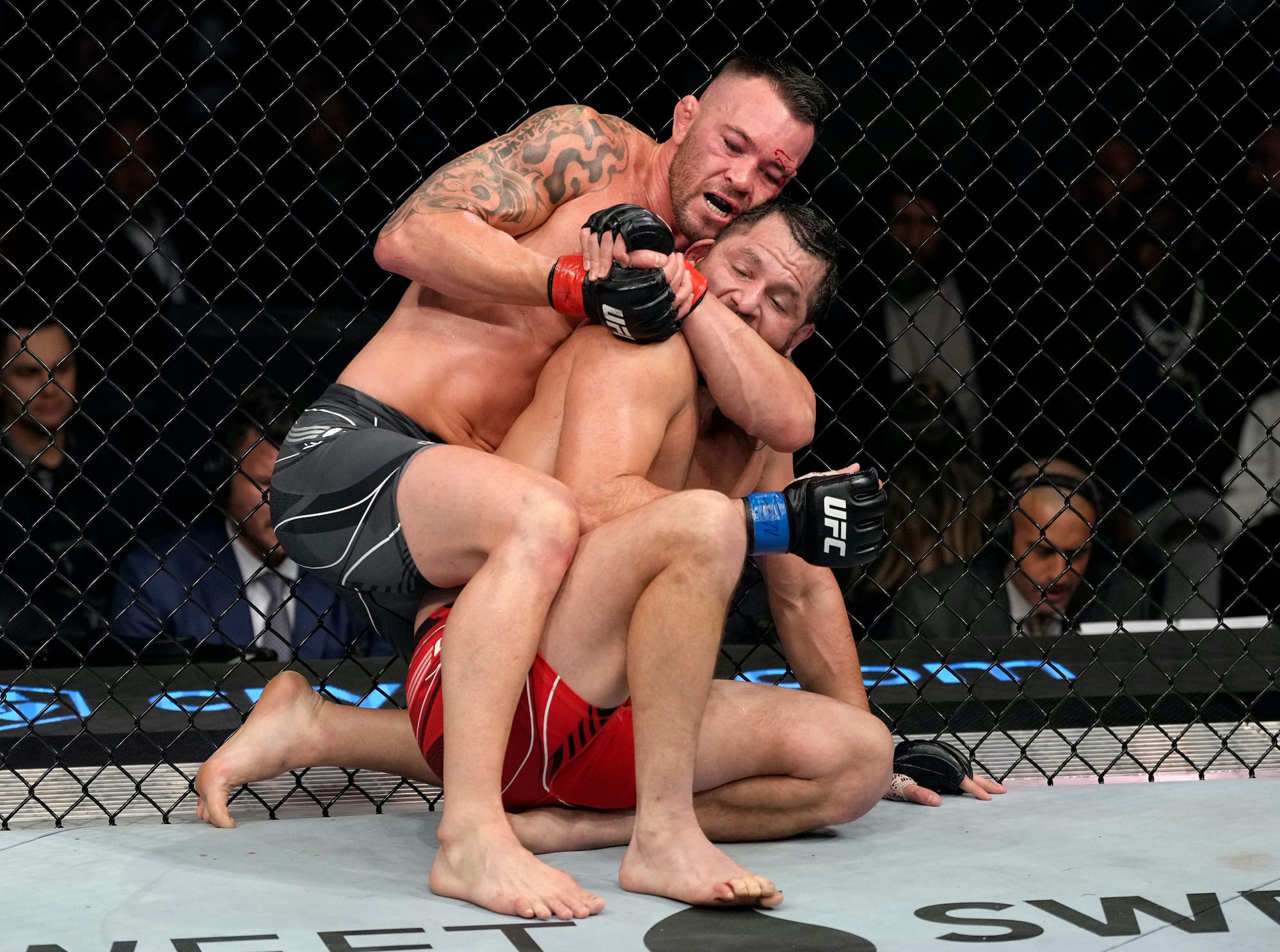 Colby Covington attempts to submit Jorge Masvidal at UFC 272.