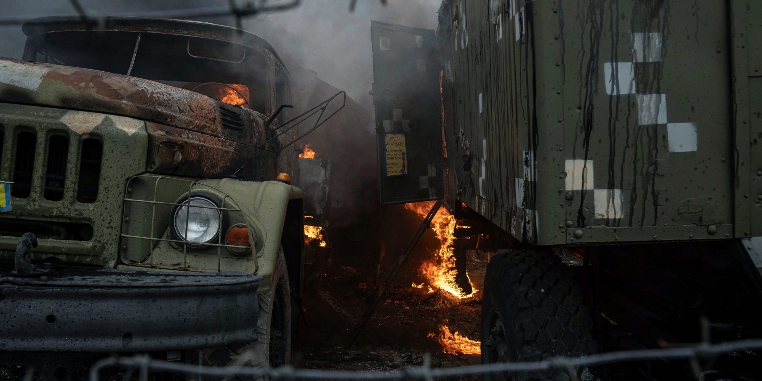 Ukrainian military track burns at an air defence base in the aftermath of a reported Russian strike in Mariupol, Ukraine.