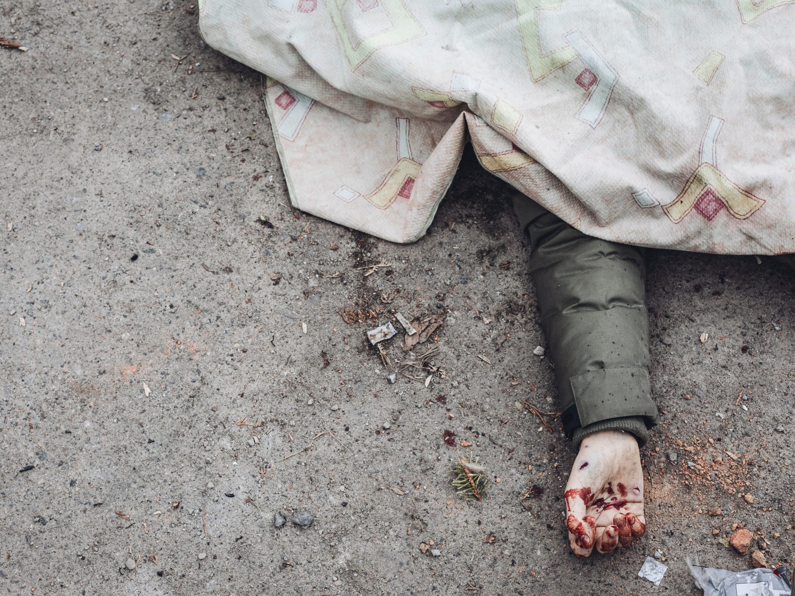 A dead body of a person killed by Russian shelling.