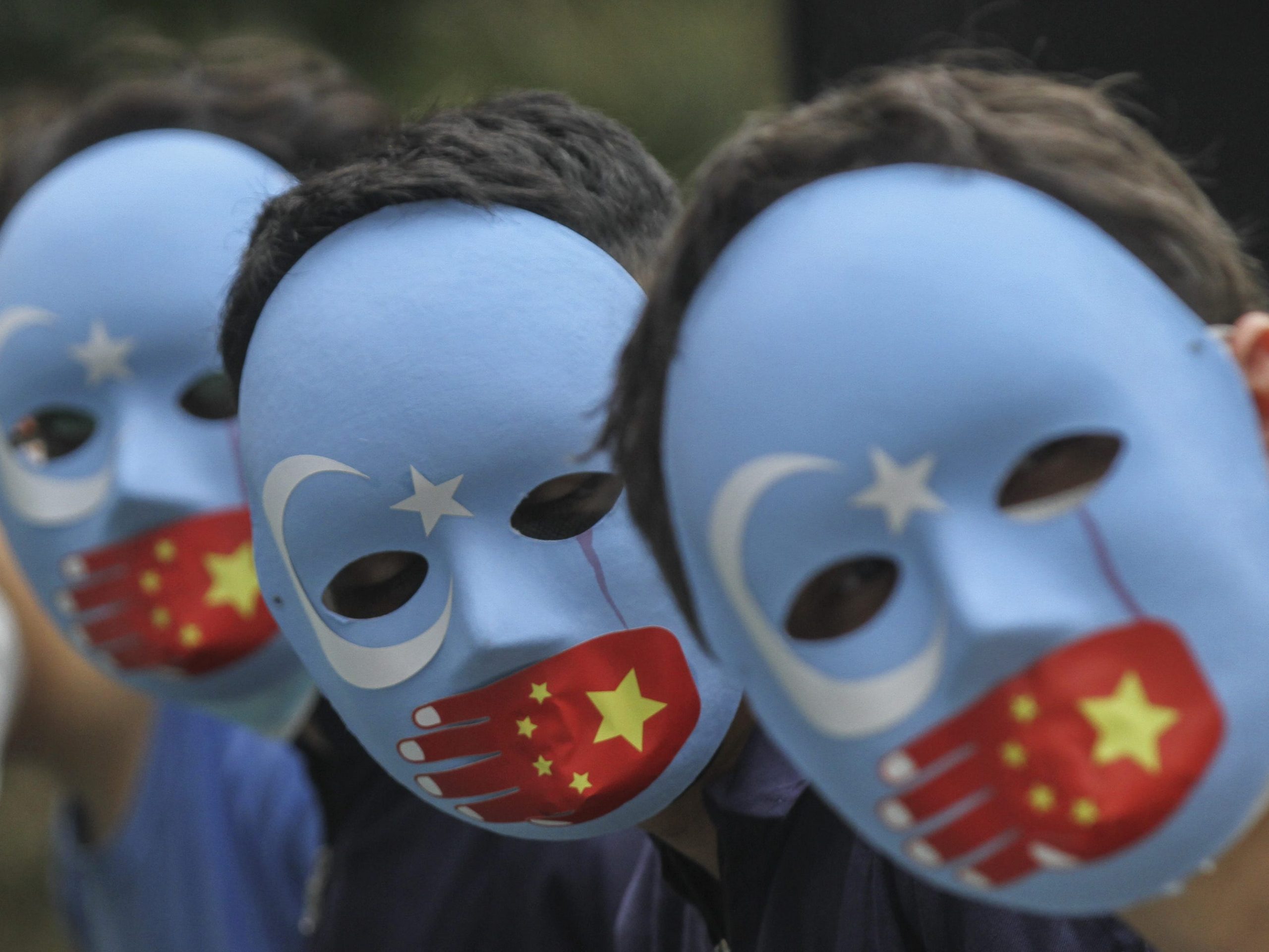 Activists hold a demonstration against China's policies towards Uyghur Muslims in Jakarta, Indonesia on January 4, 2021.