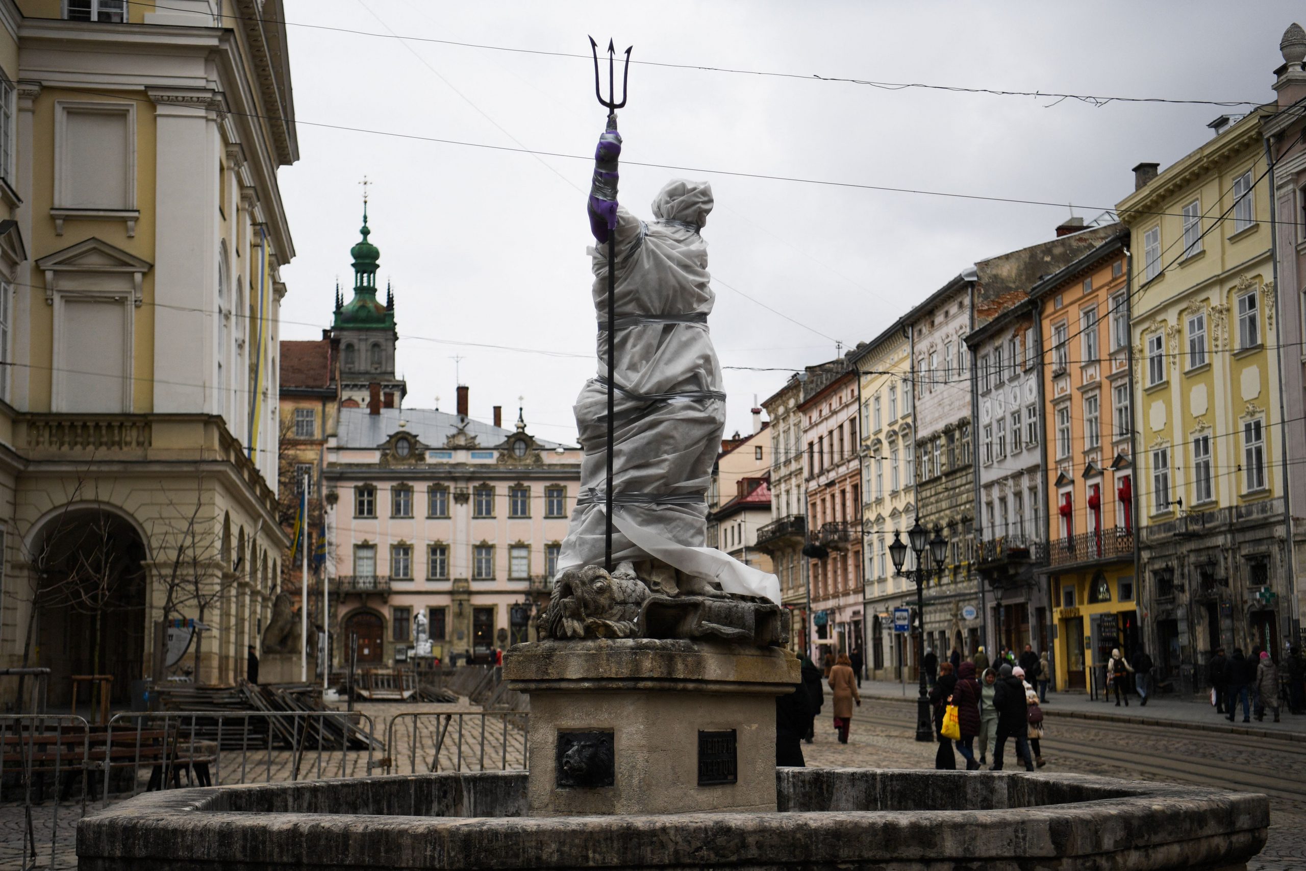 A statue outside the Latin Cathedral in Lviv, western Ukraine, is wrapped up to protect it from potential damage.