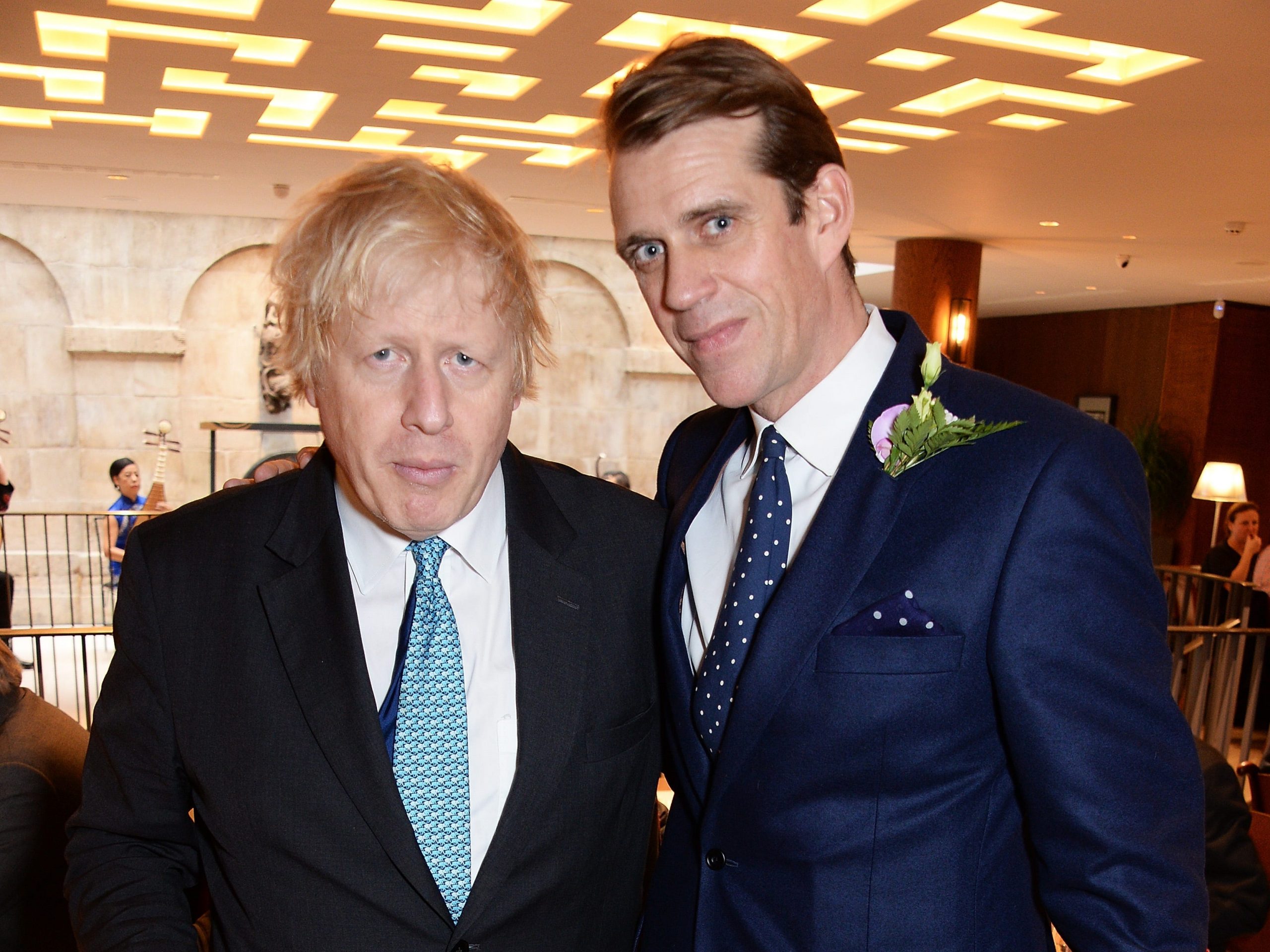 Prime Minister Boris Johnson poses with Ben Elliot, Conservative party co-chairman