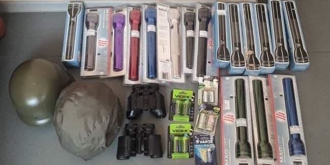 Flashlights, batteries, binoculars, and helmets collected for Ukrainian volunteer soldiers