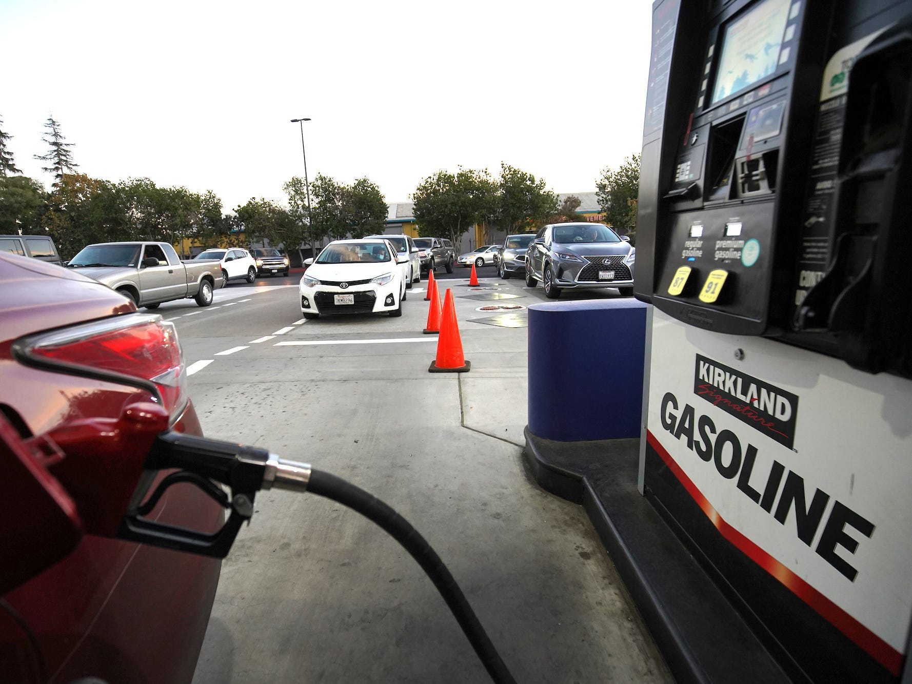 Long lines build up outside Costco and Sam's Club gas stations as ...