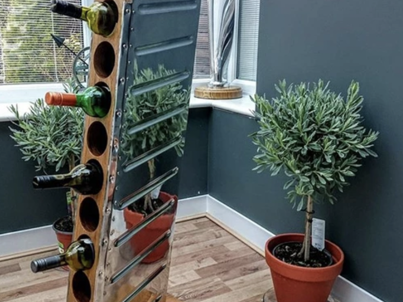 Wine rack made out of a Piper rudder.