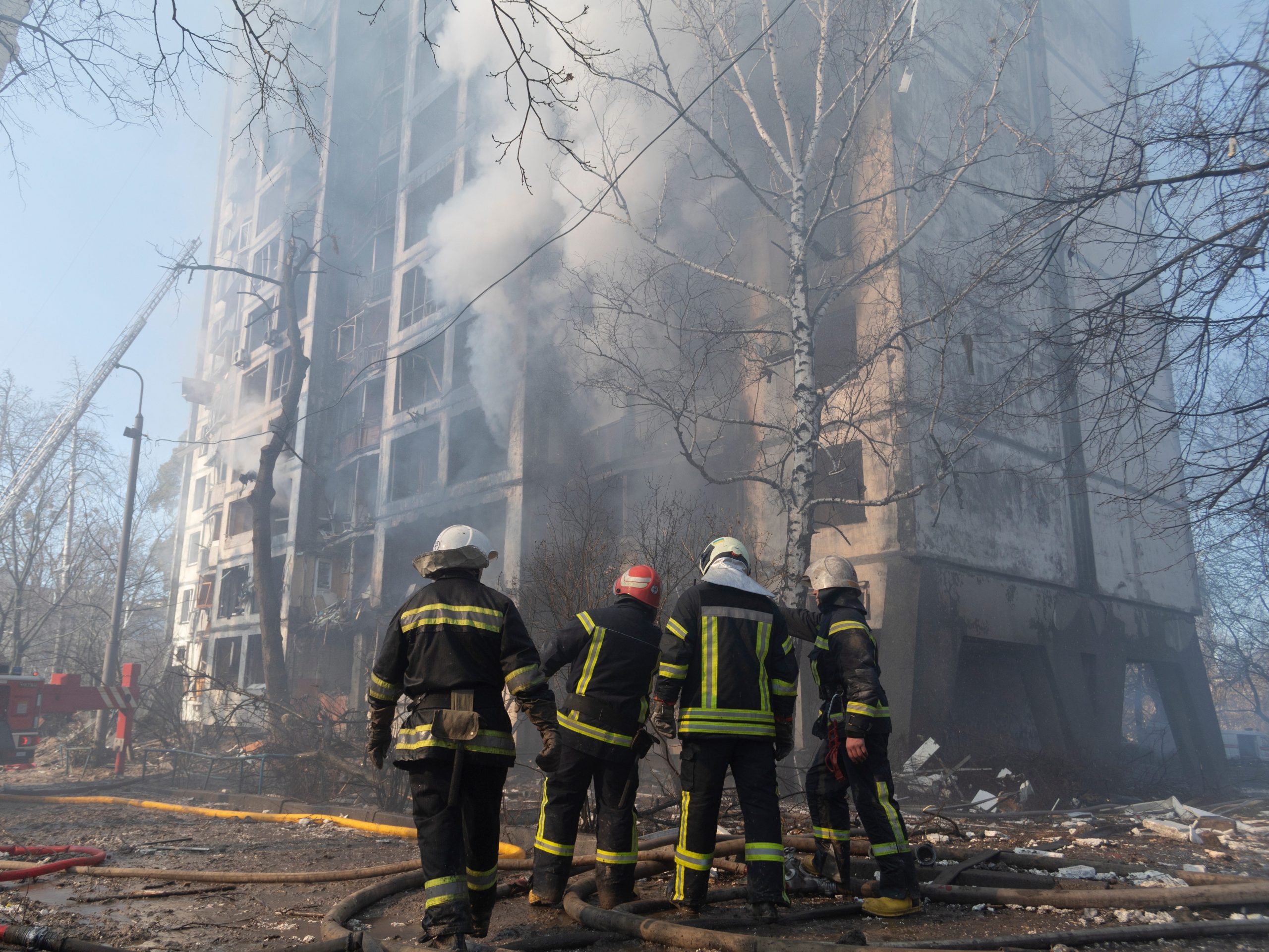 Firemen extinguishing the fire created by Russian shelling in Svyatoshyns'kyi District Kyiv, 12km from the center of the capital, on March 15, 2022.