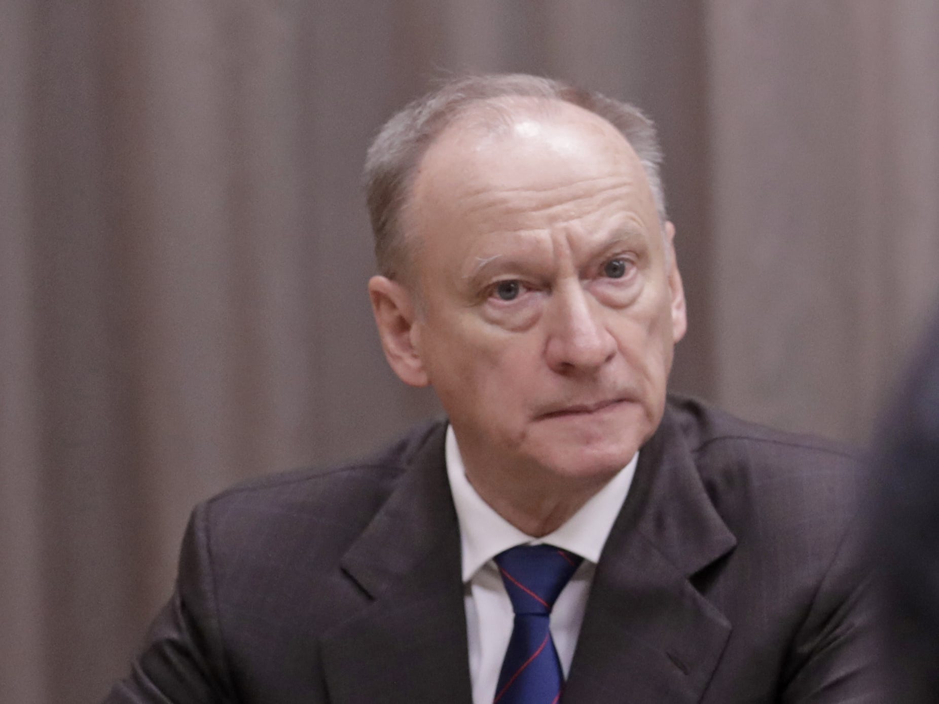Russian Security Council Secretary Nikolai Patrushev and Russia's President Vladimir Putin during a meeting with the Secretary-General of the Japanese National Security Council.