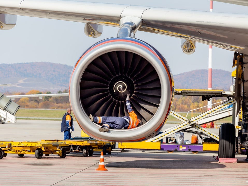 An Aeroflot engine being checked by maintenance in Russia.