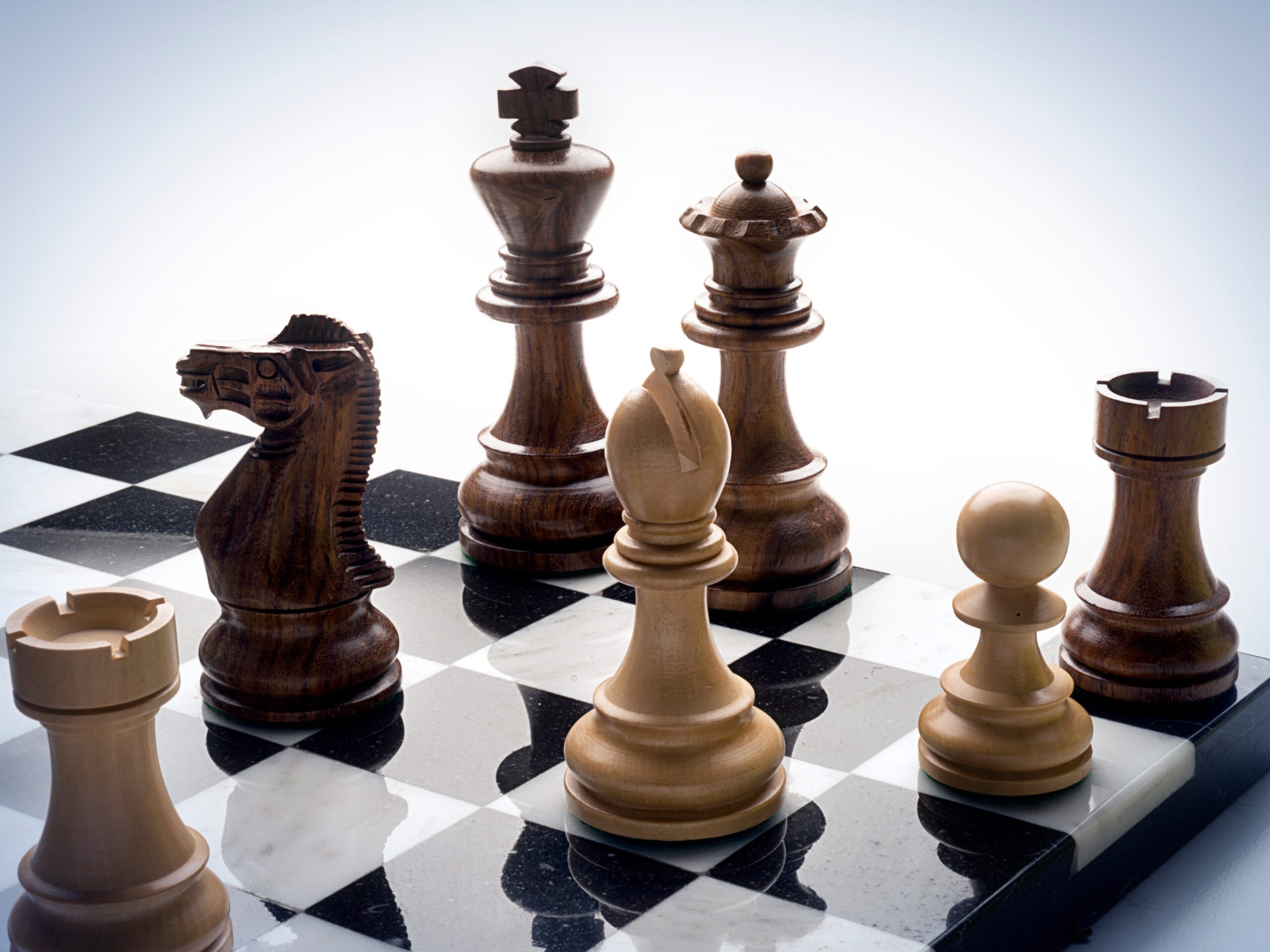 A chess board with pieces.