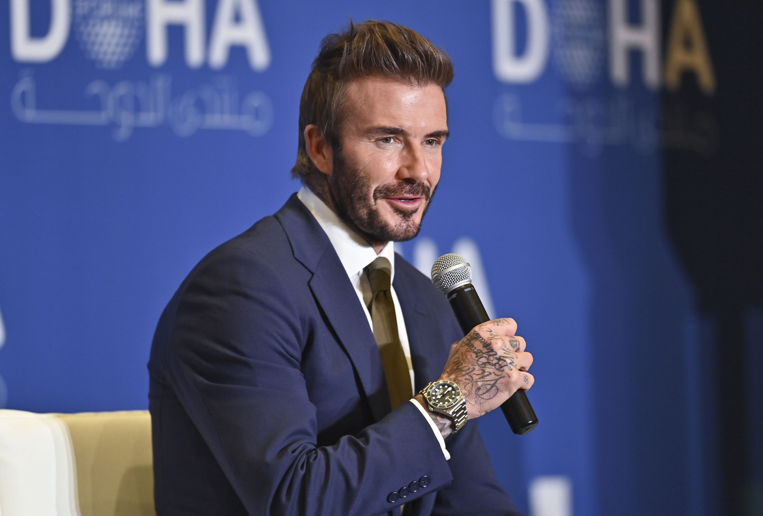 Voormalig Engels topvoetballer David Beckham tijdens een forum in de Qatarese hoofdstad Doha in maart 2022. Foto EPA/Noushad Thekkayil