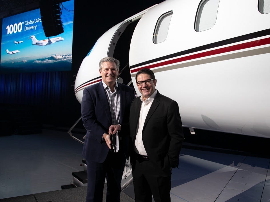 Bombardier CEO Éric Marte and NetJets president of sales, marketing, and services at the delivery ceremony of the company's first Global 7500 in December 2021 in Montreal, Canada.