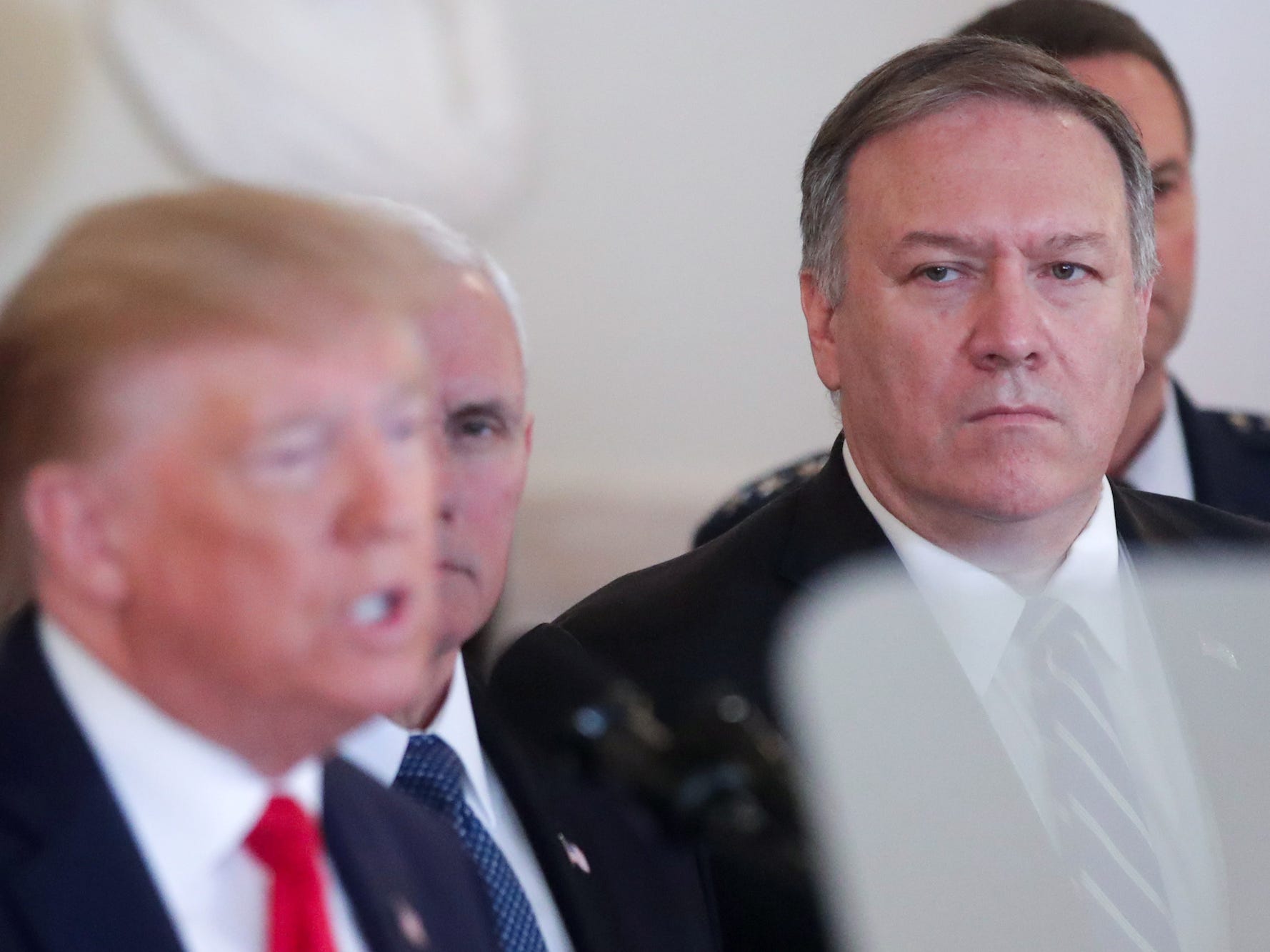 Mike Pompeo looks on as Trump speaks at the White House on January 8, 2020.