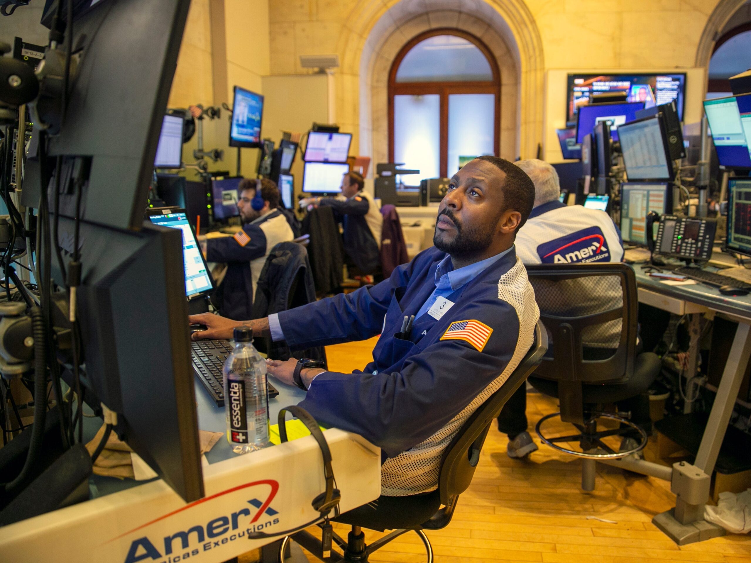 Traders work on the New York Stock Exchange floor.
