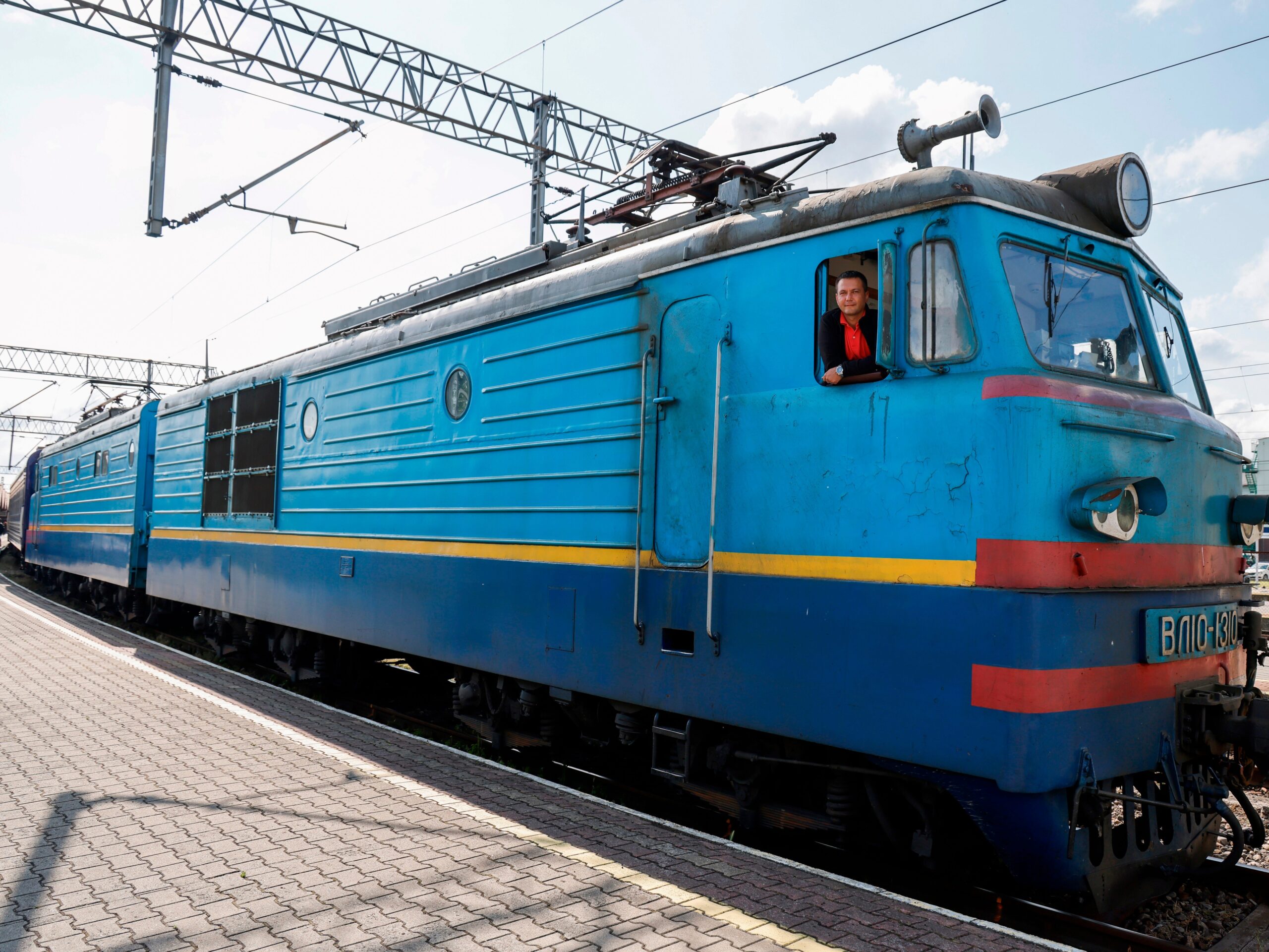 Train driver Vasyl poses in his train at Przemysl train station, Poland in June after driving the heads of state of France, Germany and Italy from Poland to Ukraine and back.