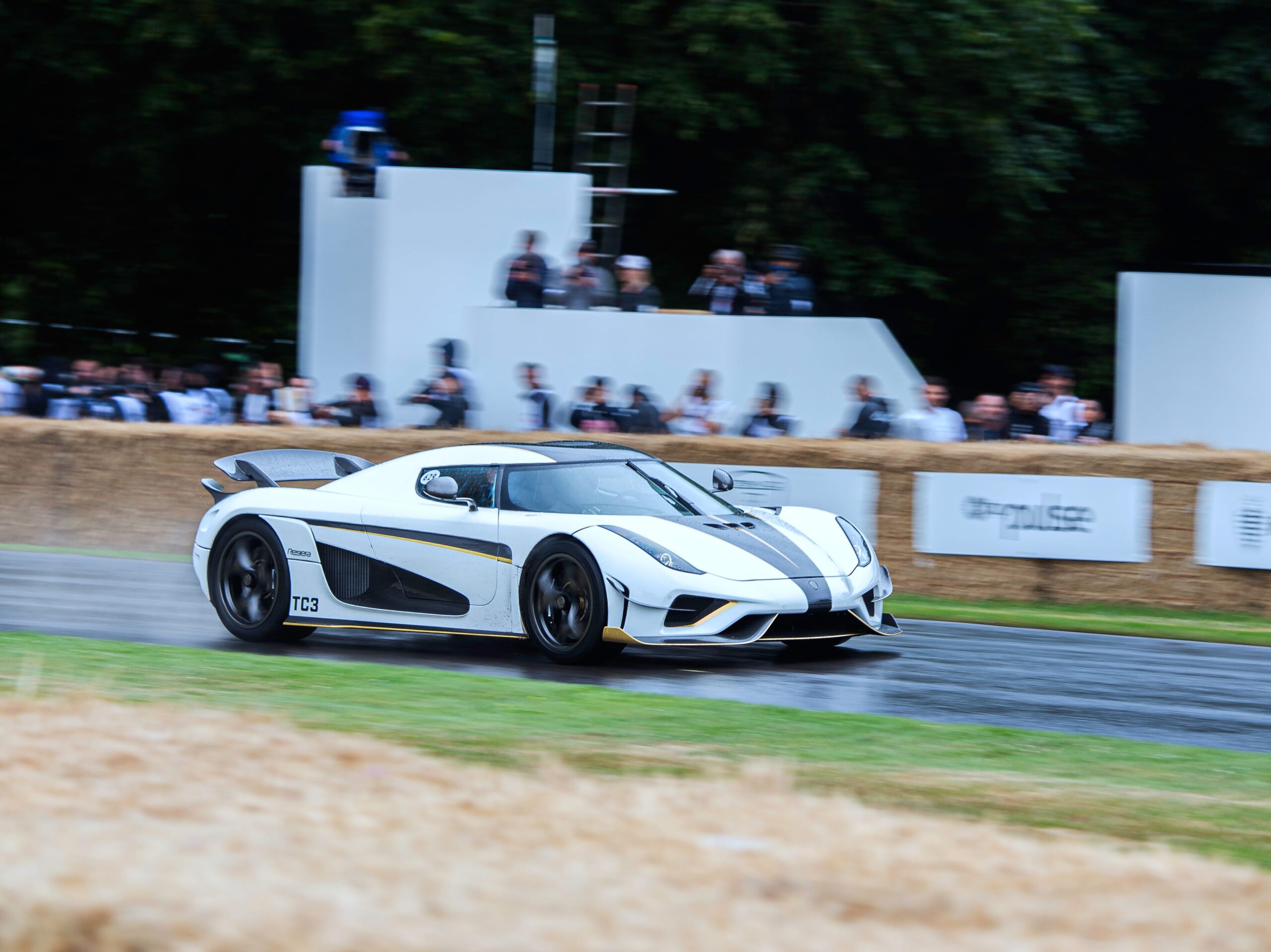 White Koenigsegg Regera on a track