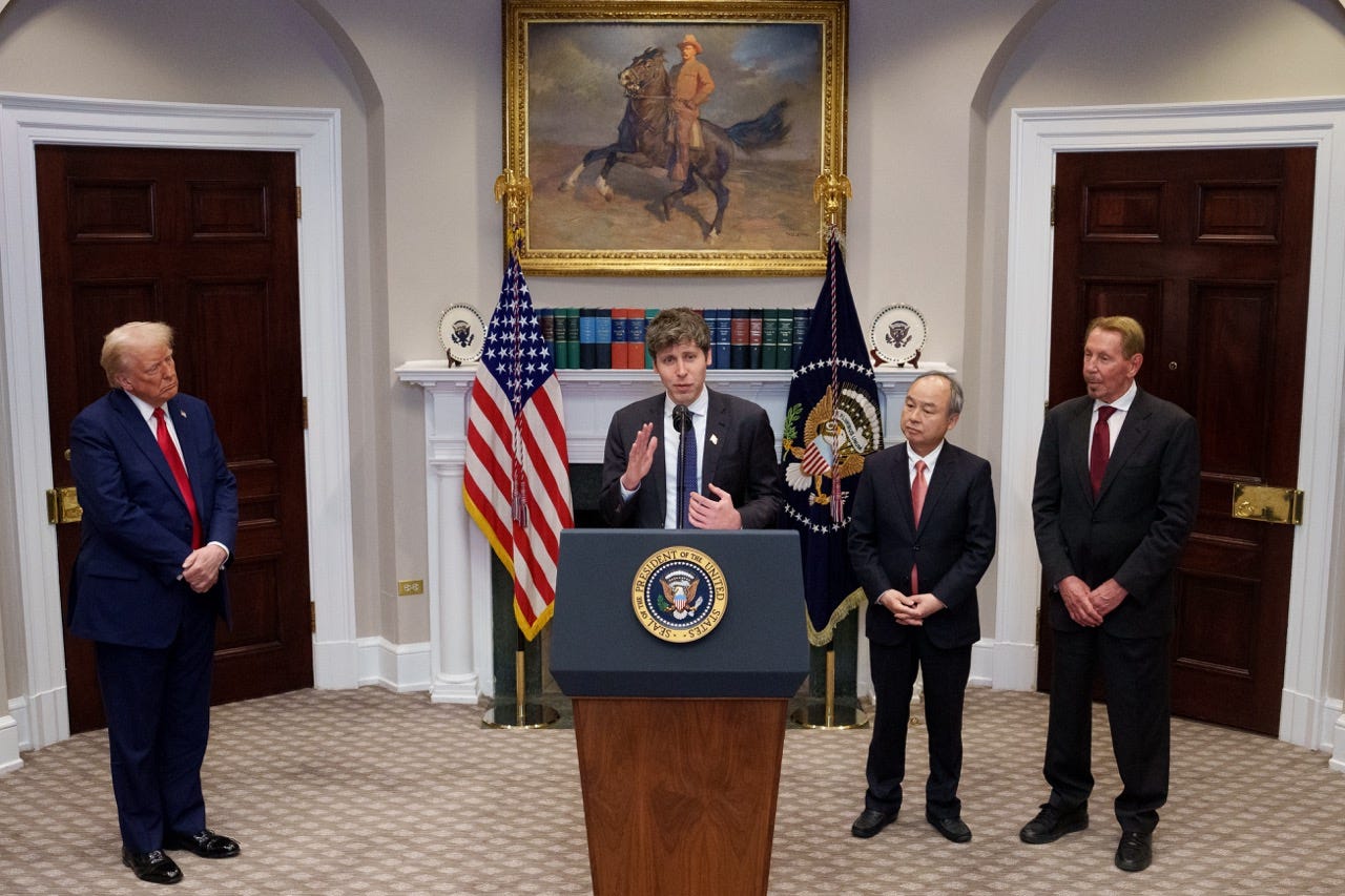 Donald Trump, Masayoshi Son, and Larry Ellison standing next to Sam Altman