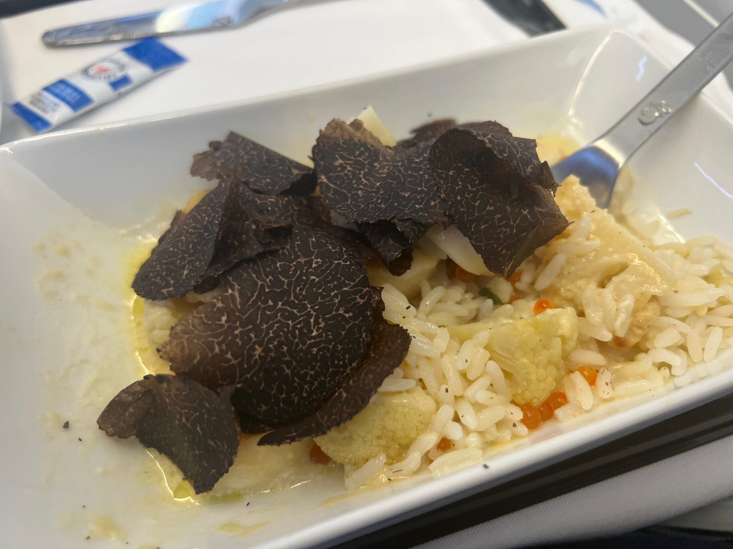 Flying on La Compagnie all-business class airline from Paris to New York &mdash; the dish with truffles on top.