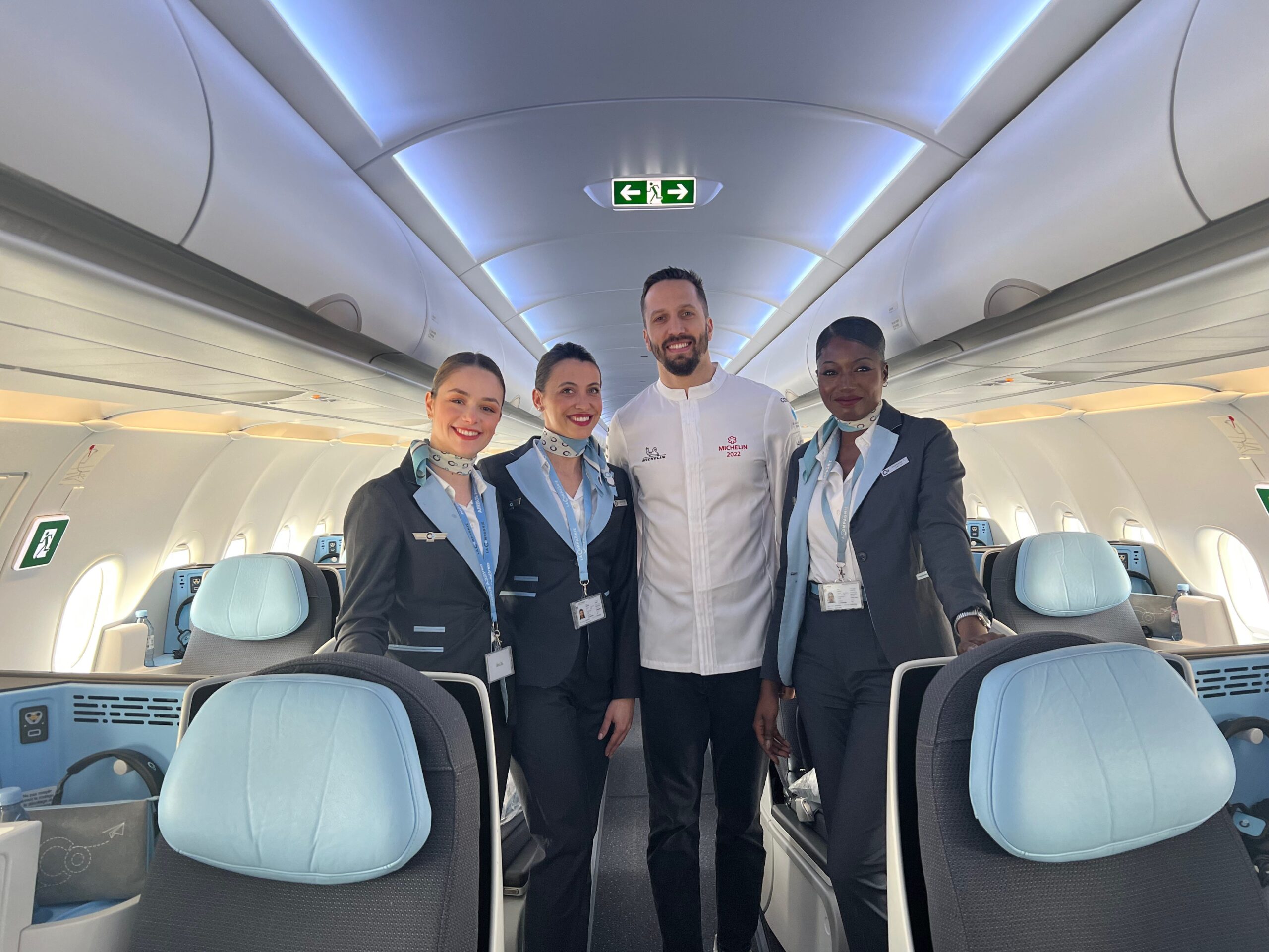 Flying on La Compagnie all-business class airline from Paris to New York &mdash; chef Franco Sampogna with the flight attendants.