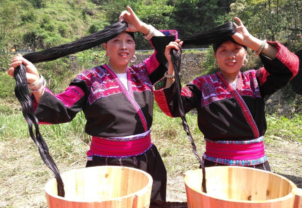 Red Yao women washing their hair