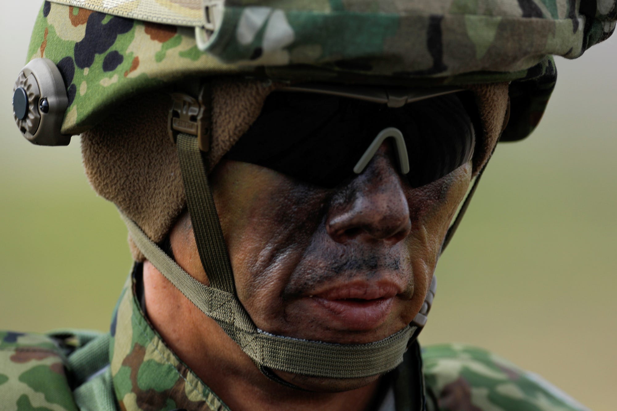 A soldier from Japan&#39;s Ground Self-Defense Force participates in a beach invasion drill at Camp Pendleton, California in February 2019