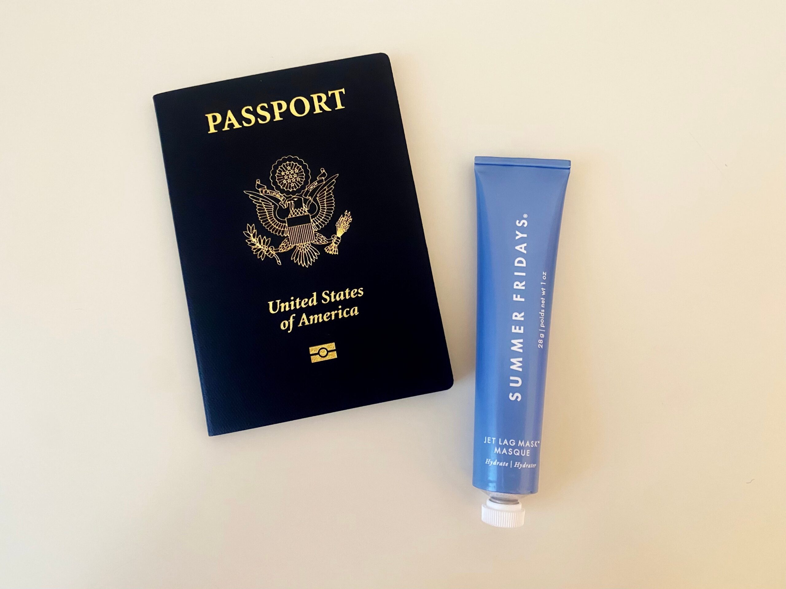 Summer Fridays Jet Lag Mask and Passport.