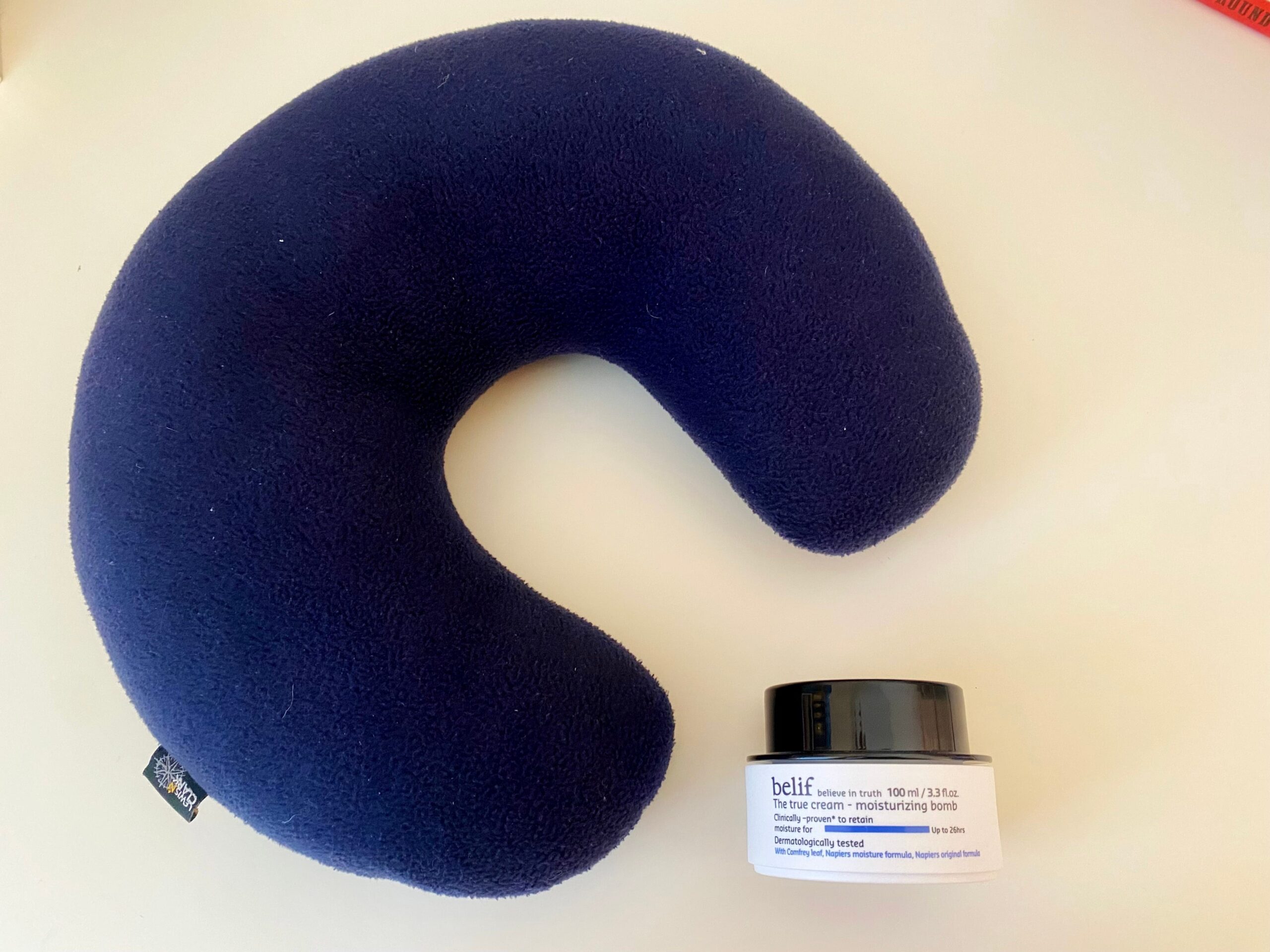 Belif The Moisturizing Bomb with a neck pillow.