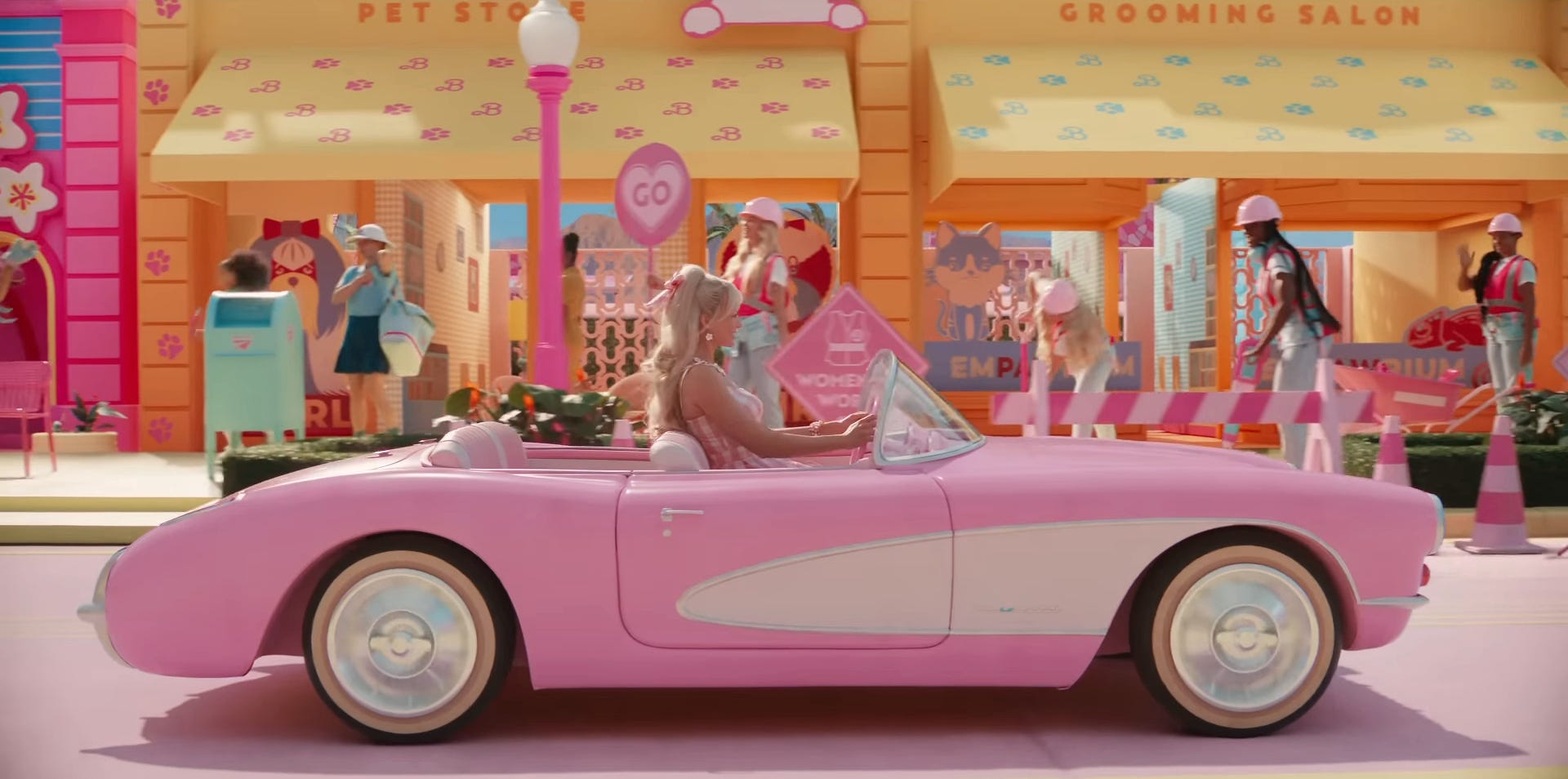 Margot Robbie&#39;s Stereotypical Barbie driving in &#34;Barbie.&#34;