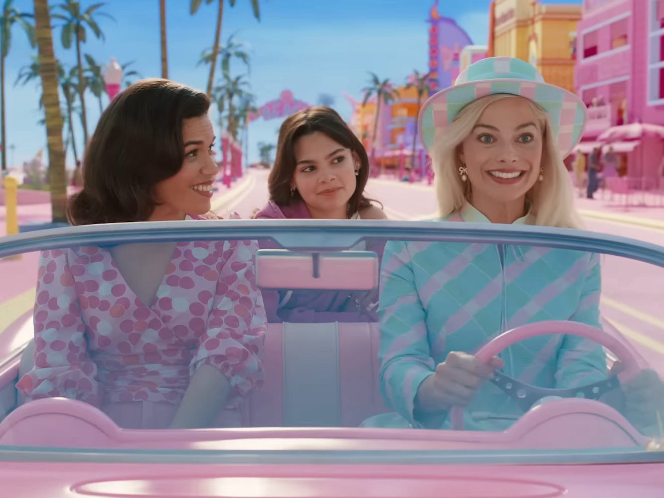 America Ferrera as Gloria, Ariana Greenblatt as Sasha, and Margot Robbie as Barbie in &#34;Barbie.&#34;