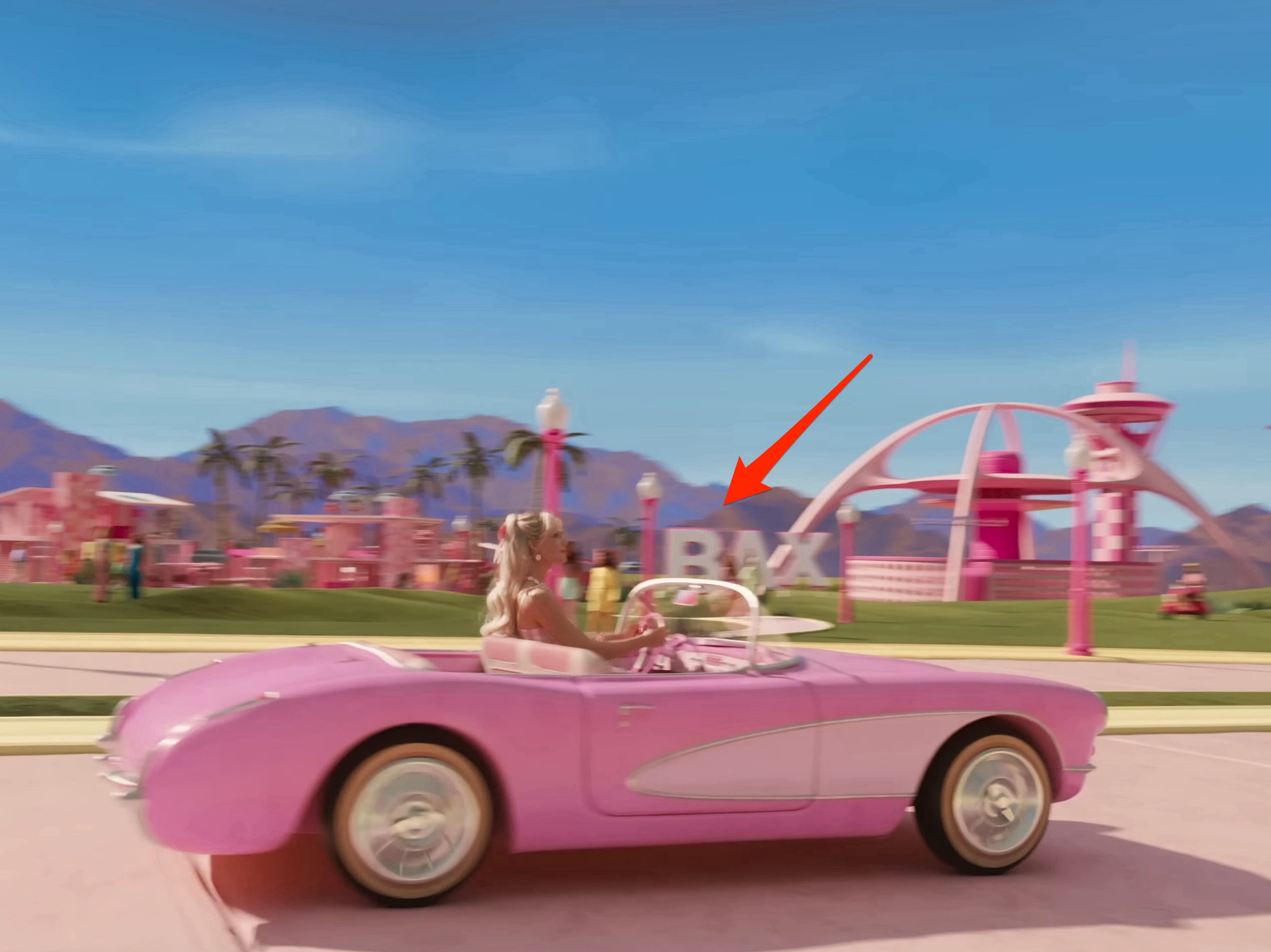A red arrow pointing to BAX in &#34;Barbie.&#34;