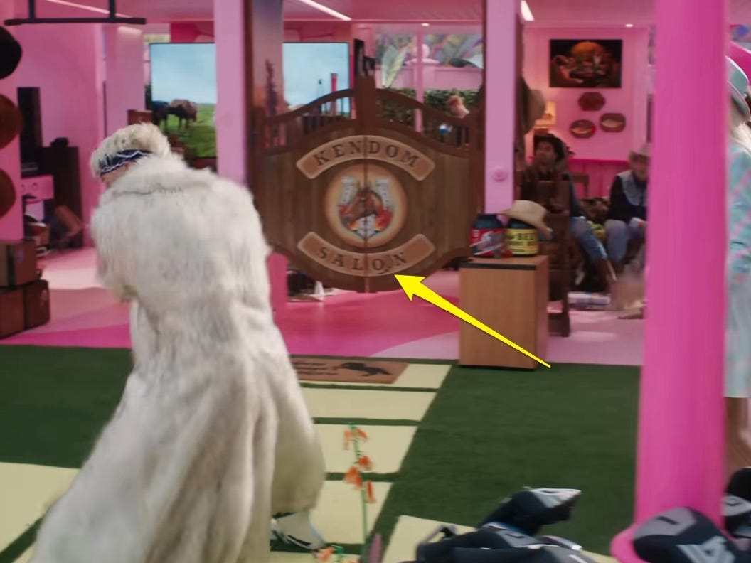 A yellow arrow pointing to a saloon sign in &#34;Barbie.&#34;