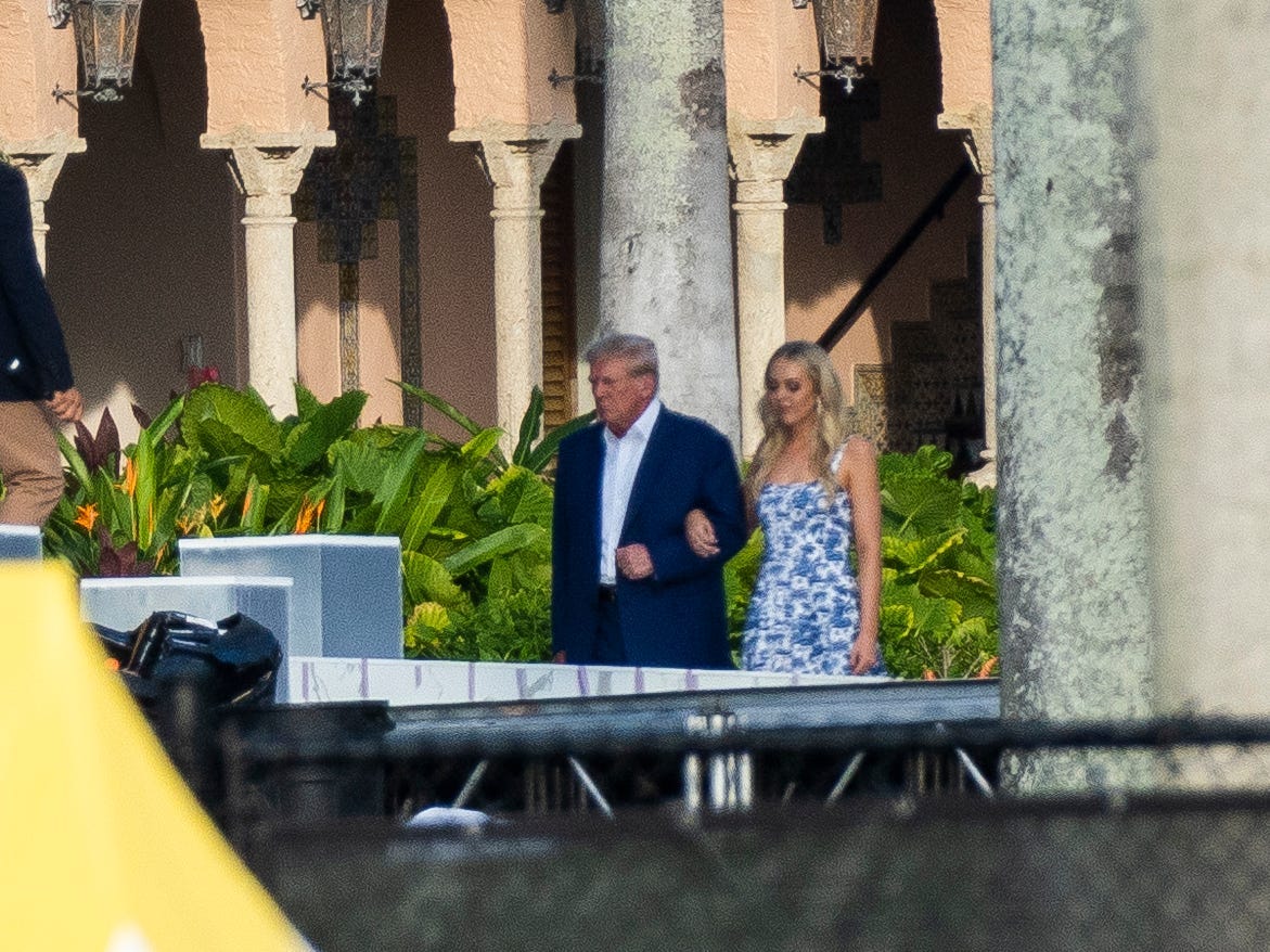 Tiffany Trump is seen with Donald Trump the day before her Mar-a-Lago wedding on November 11, 2022 in Miami, Florida.